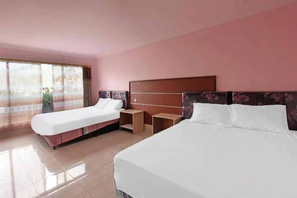 Bed in OYO 91744 Hotel Gemilang
