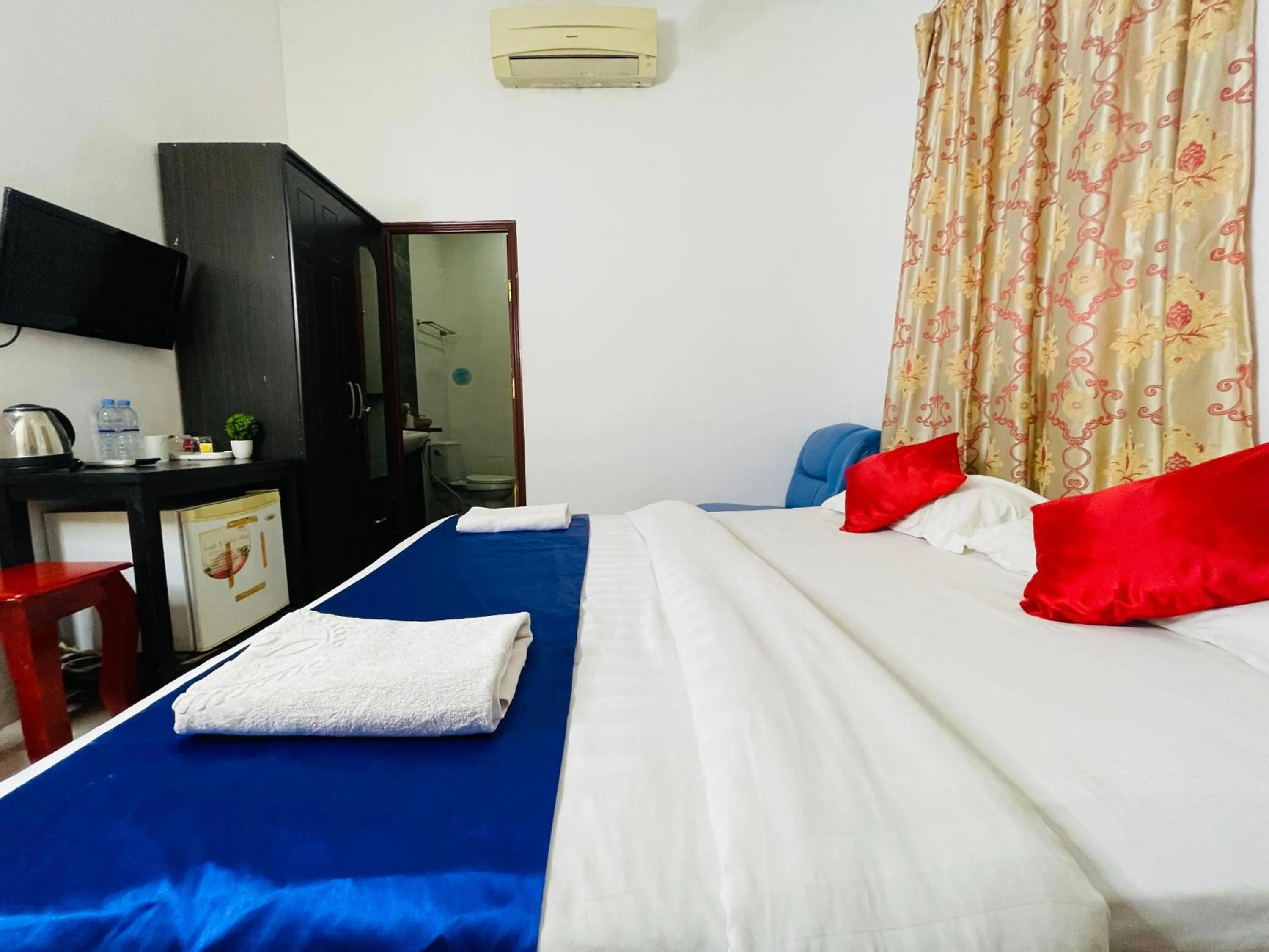 Bed in New Season Riverside Hotel