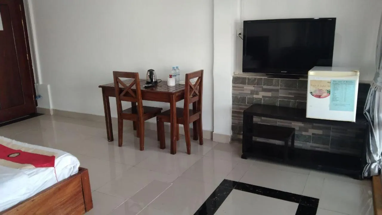 Bed in New Season Riverside Hotel