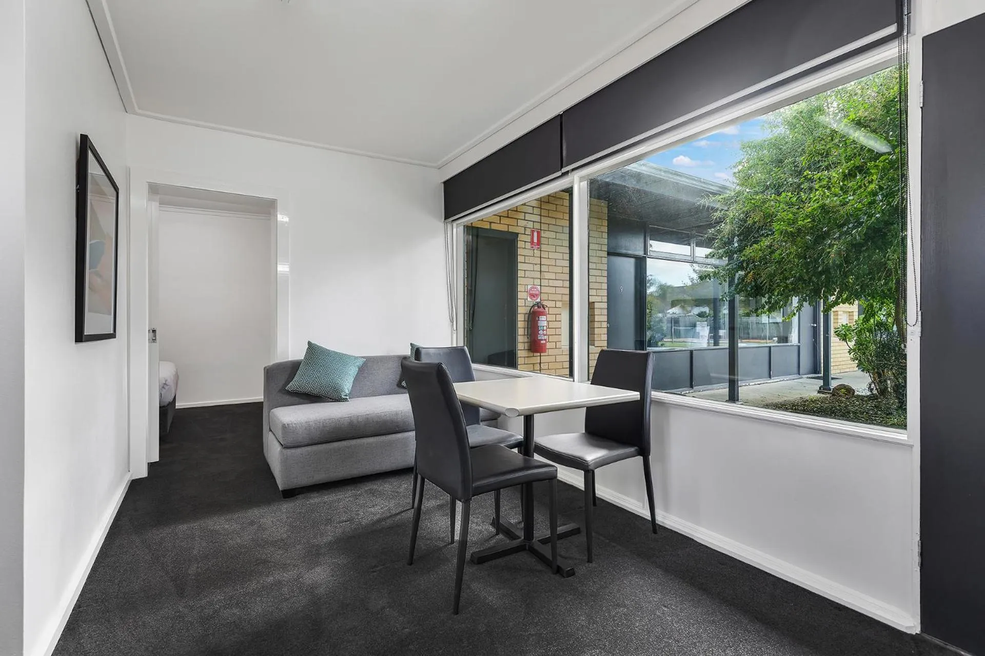 Seating area in Rochester Motel