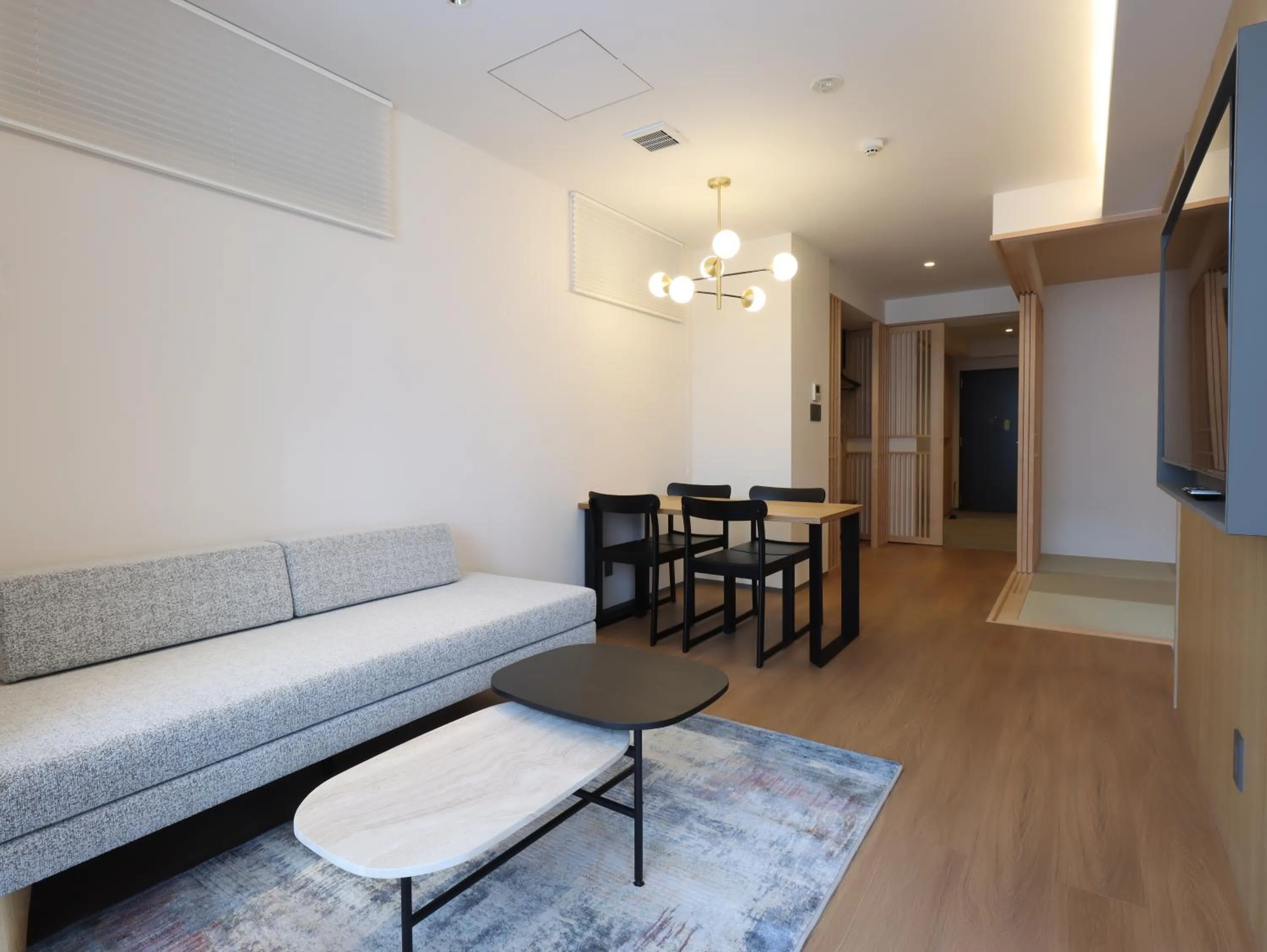 Living room in HOTEL Tomiya with M's