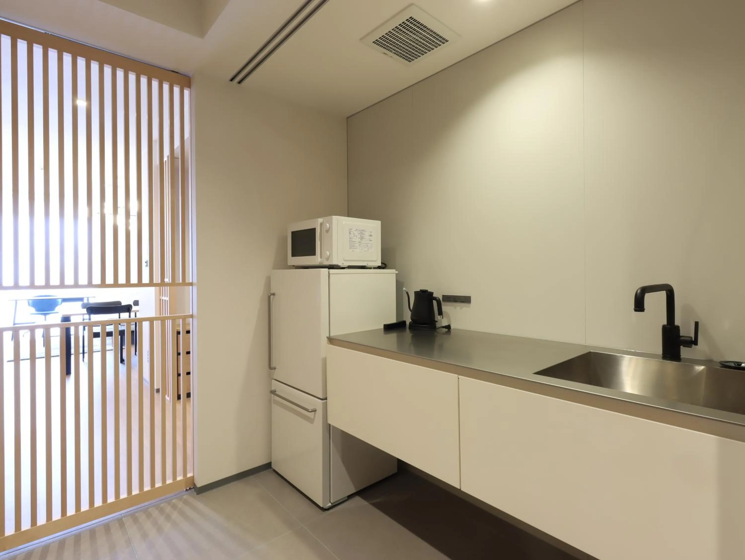 Kitchen or kitchenette in HOTEL Tomiya with M's