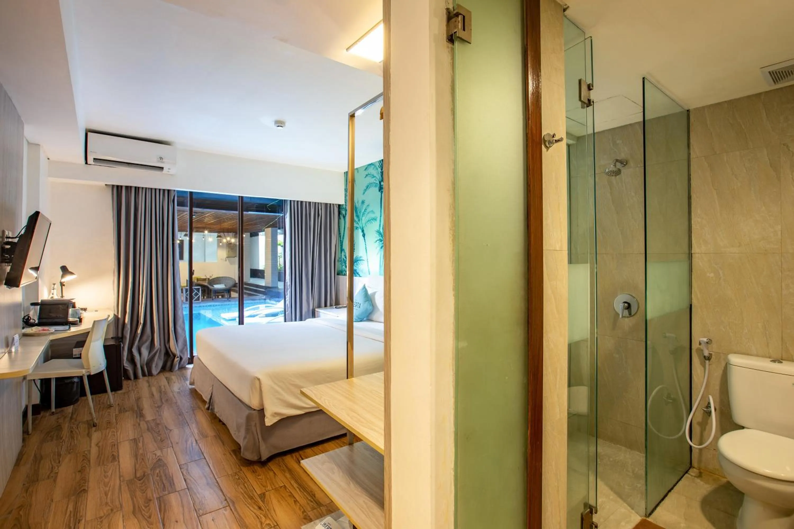 Bed in Liberta Seminyak Hotel