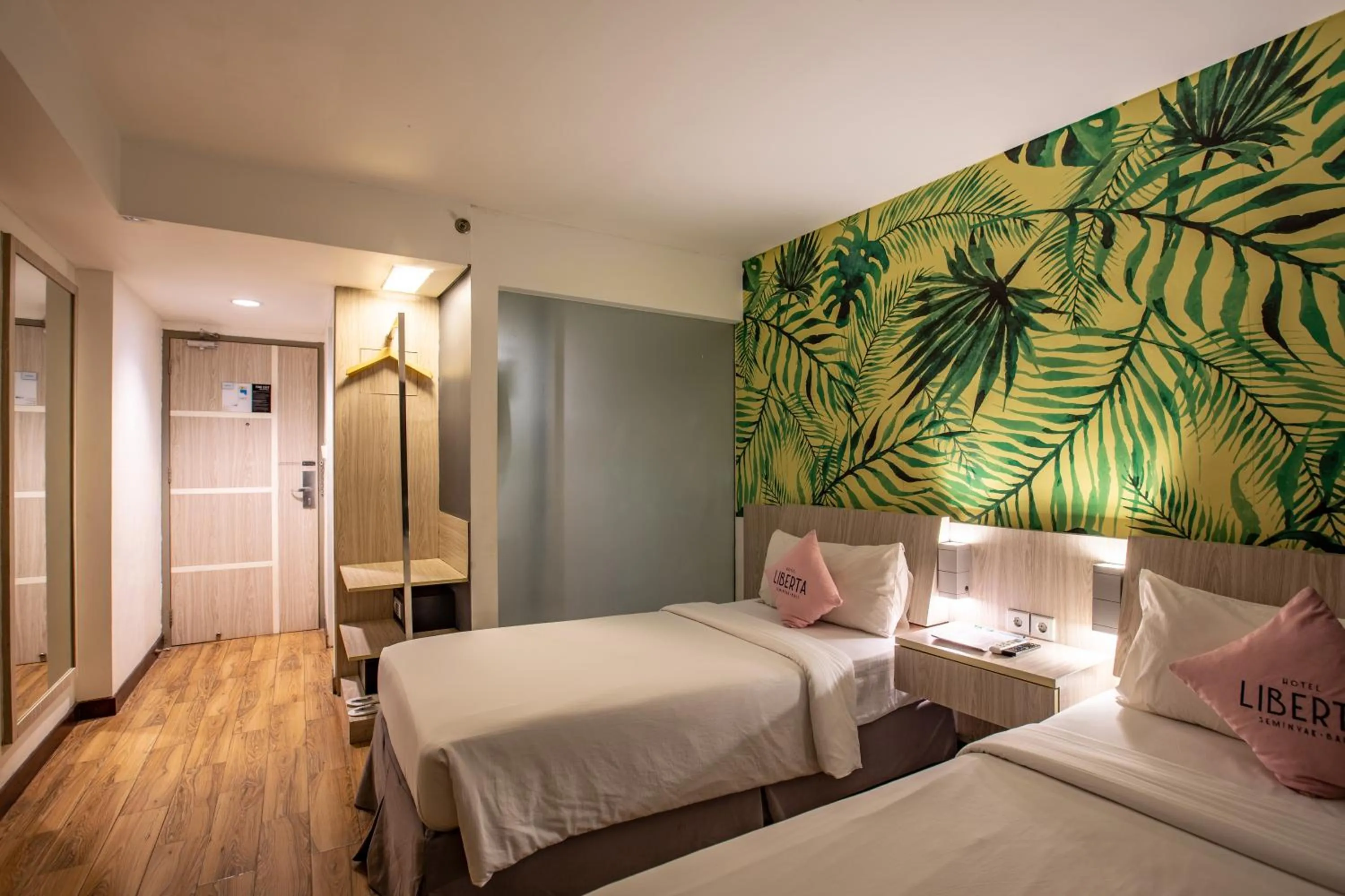 Bed in Liberta Seminyak Hotel