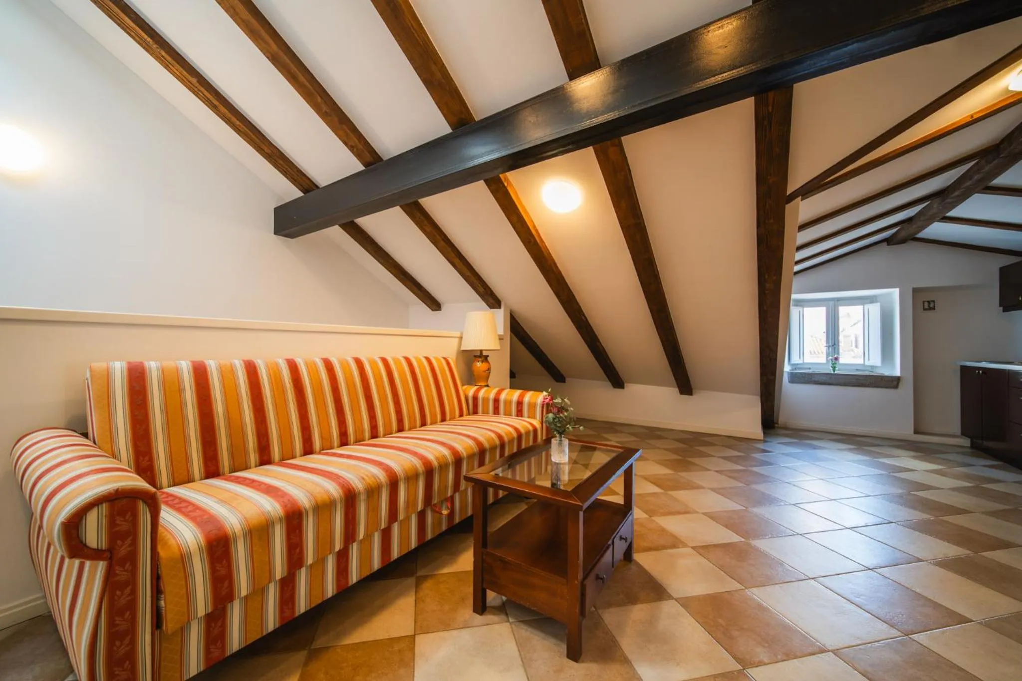 Living room in SUNce Palace Apartments with free offsite parking