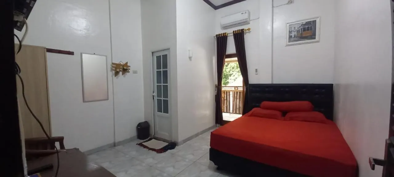 Bedroom, Bed in Krui penginapan jokowi