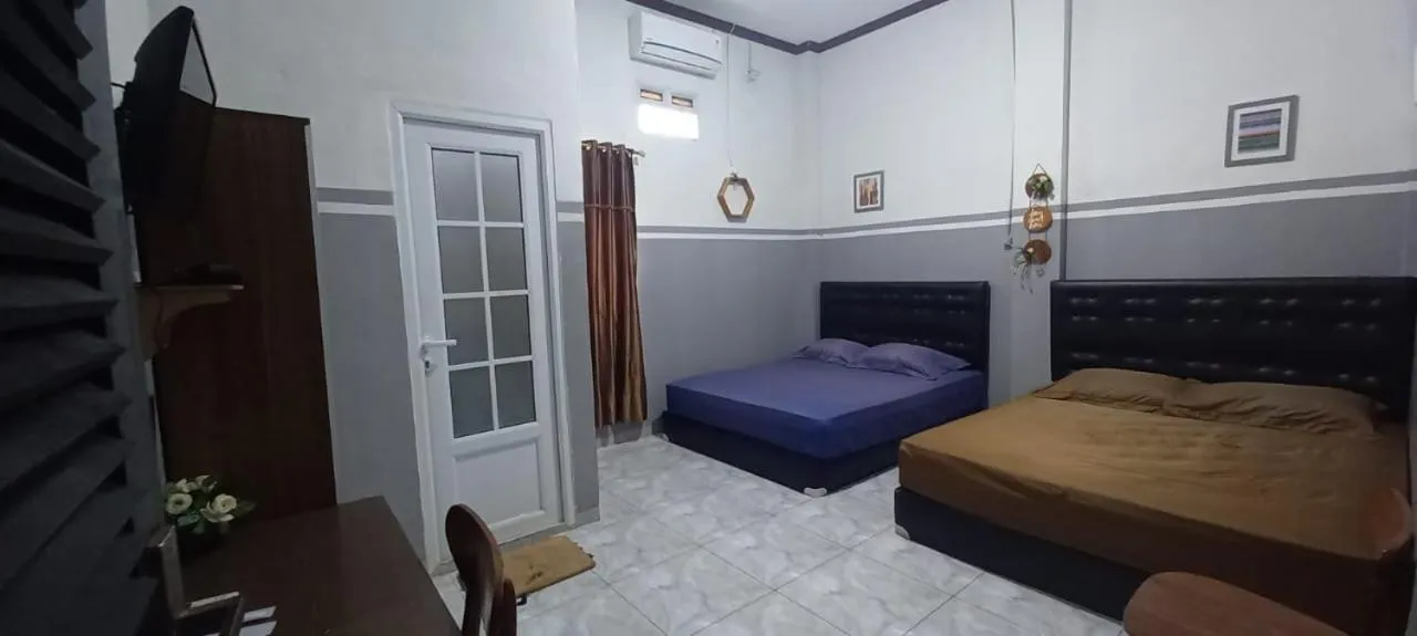 Bedroom, Bed in Krui penginapan jokowi