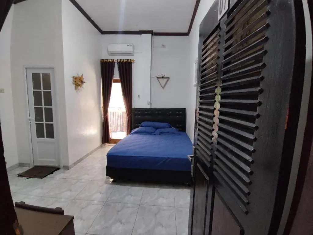 Superior Double Room in Krui penginapan jokowi Superior Double Room in Krui penginapan jokowi