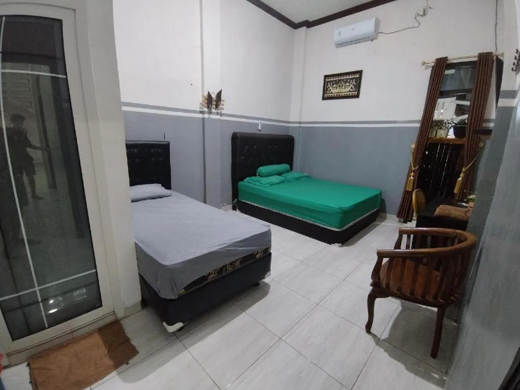 Bedroom, Bed in Krui penginapan jokowi