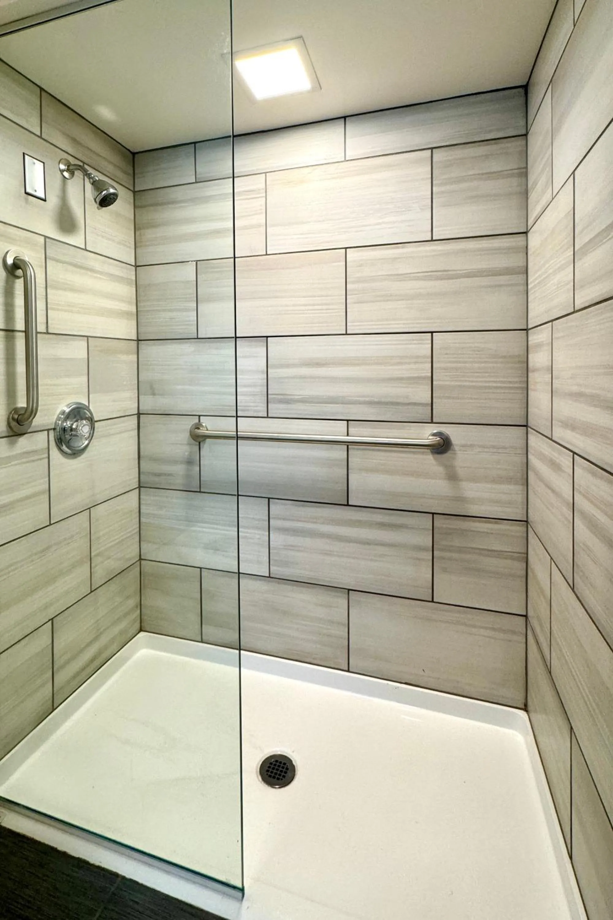 Shower in The GEM Museum Suites