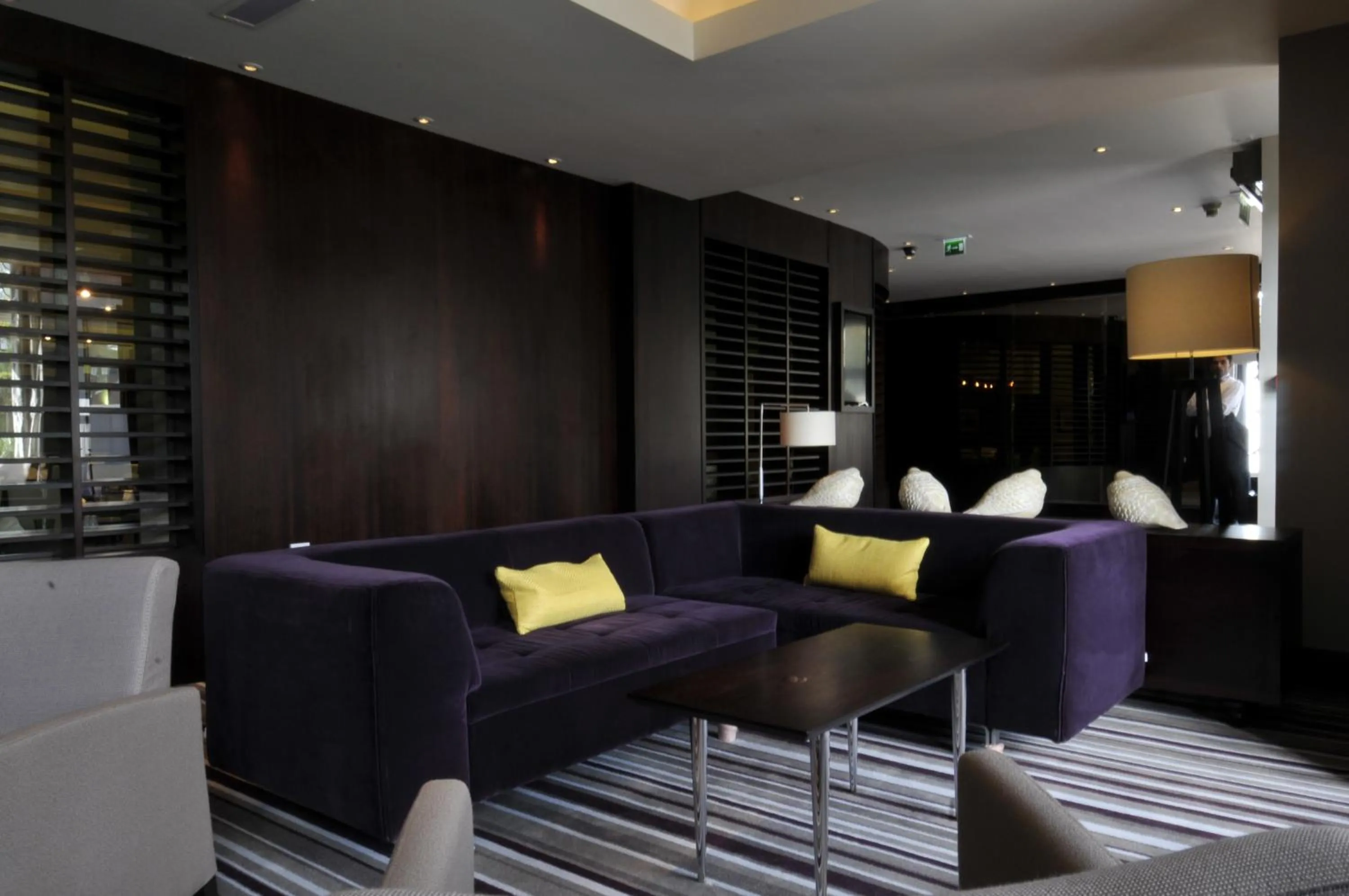 Communal lounge/ TV room in The Golf Hotel Woodhall Spa