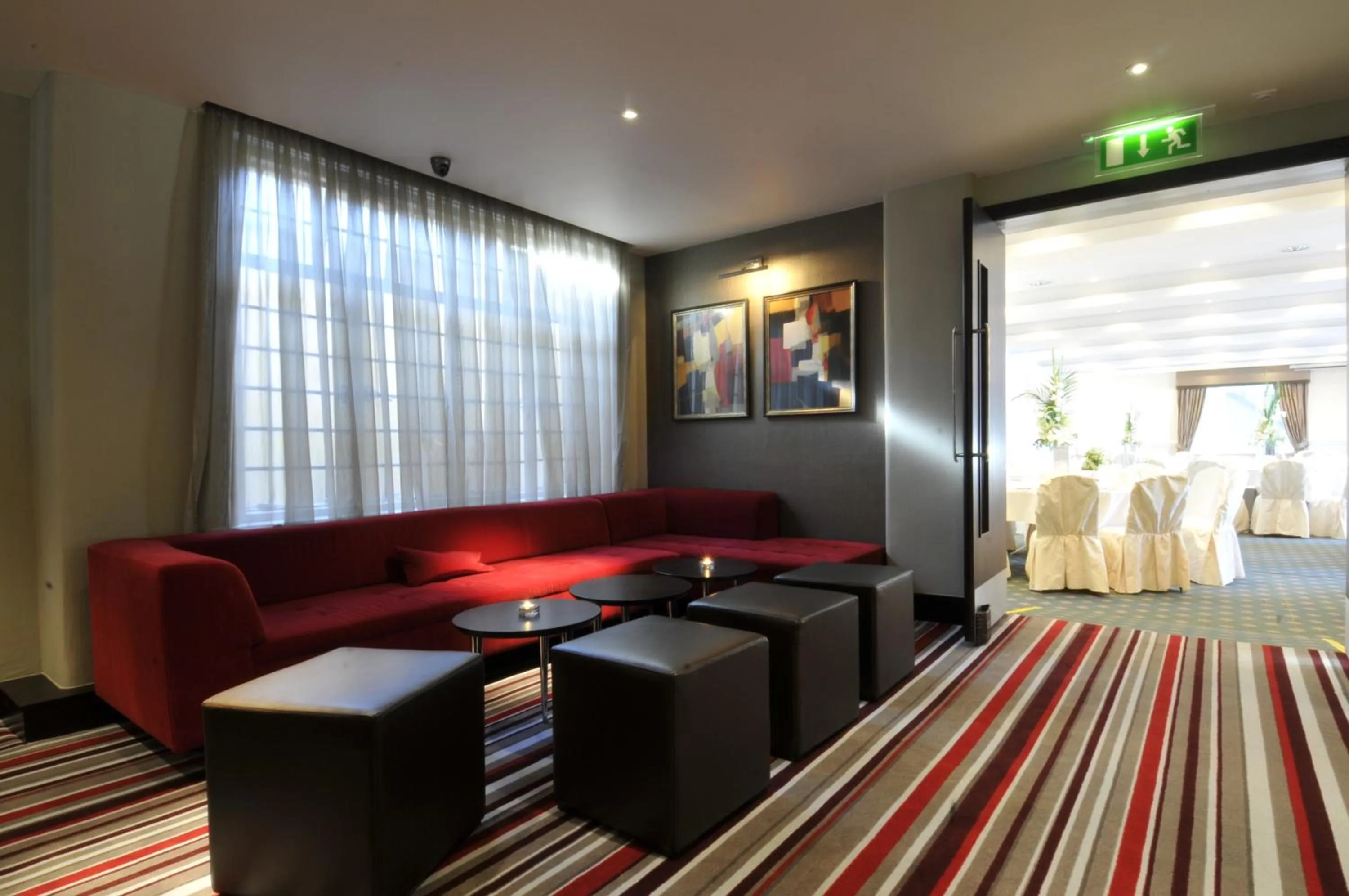 Communal lounge/ TV room in The Golf Hotel Woodhall Spa