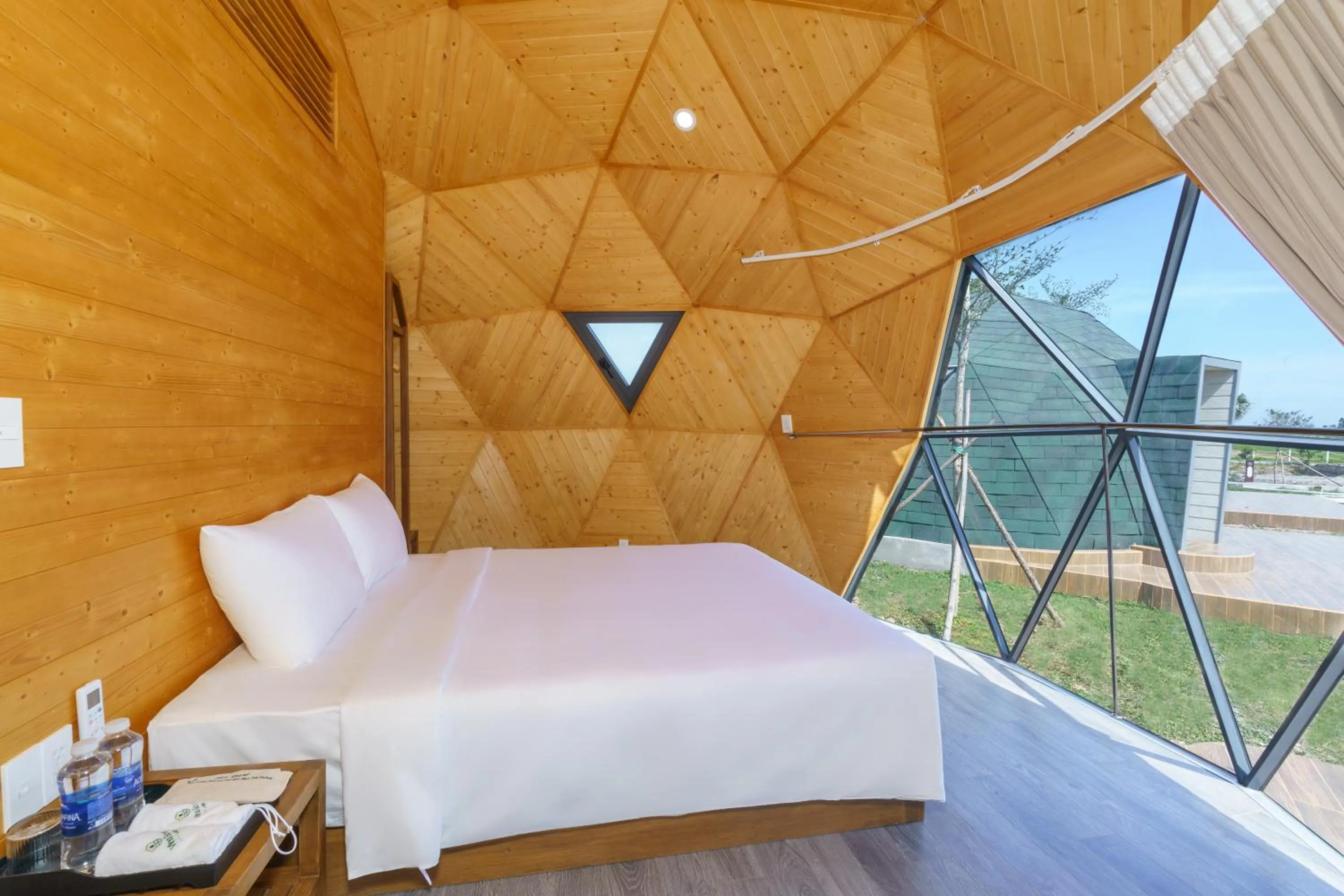 Bed in VinaEcolife Lodge