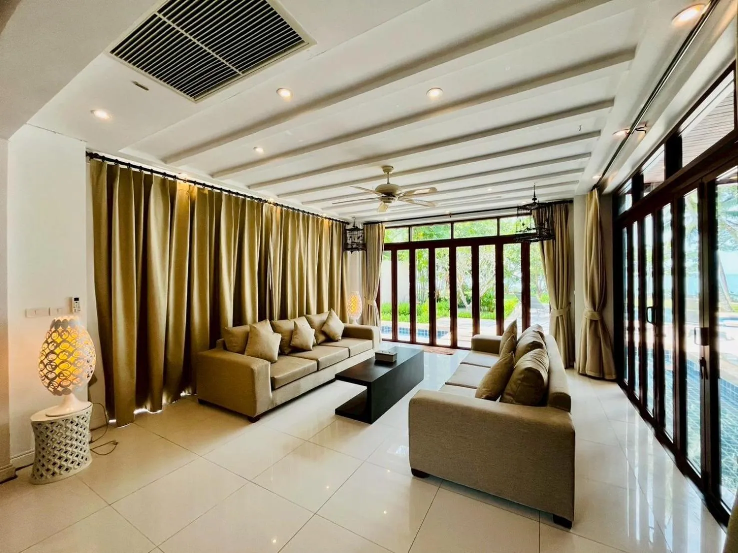 Living room in Amatapura Beachfront Villa 12, SHA Certified
