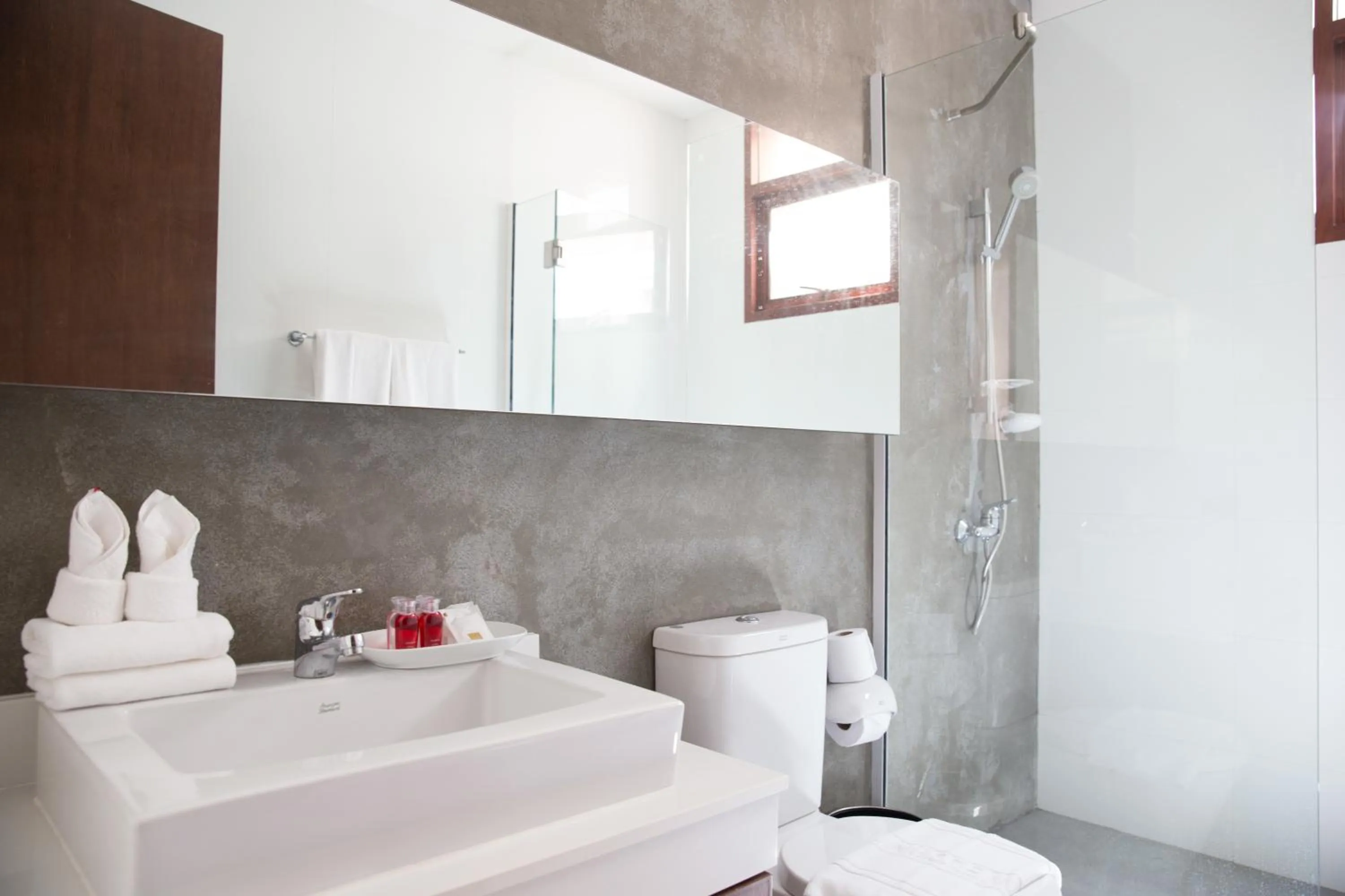 Bathroom in Amatapura Beachfront Villa 14, SHA Certified