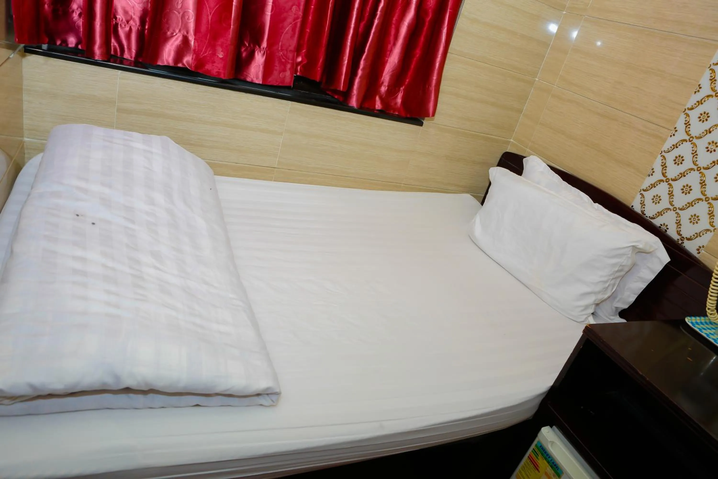 Bed in New Guangzhou Guest House
