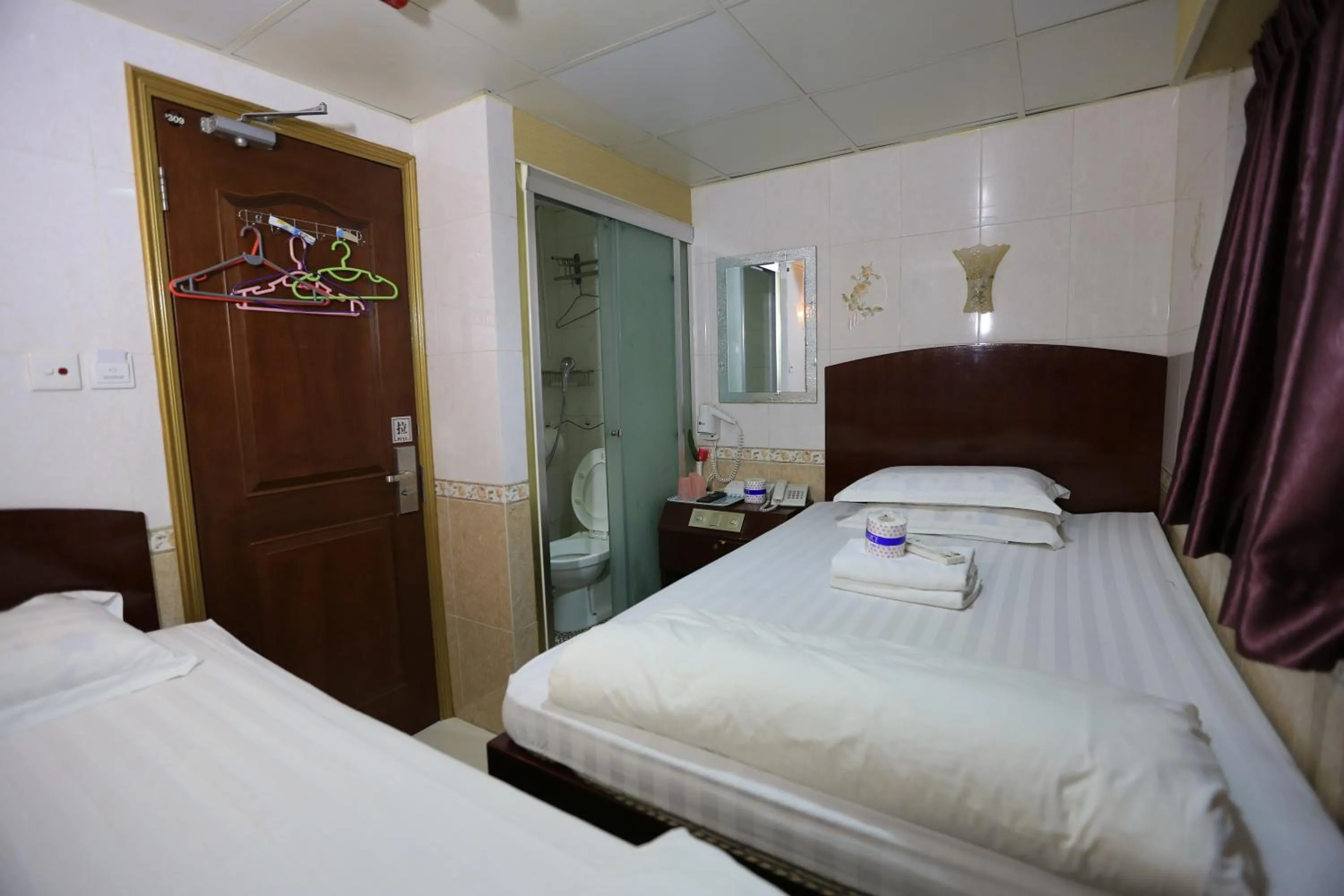Photo of the whole room, Bed in New Guangzhou Guest House