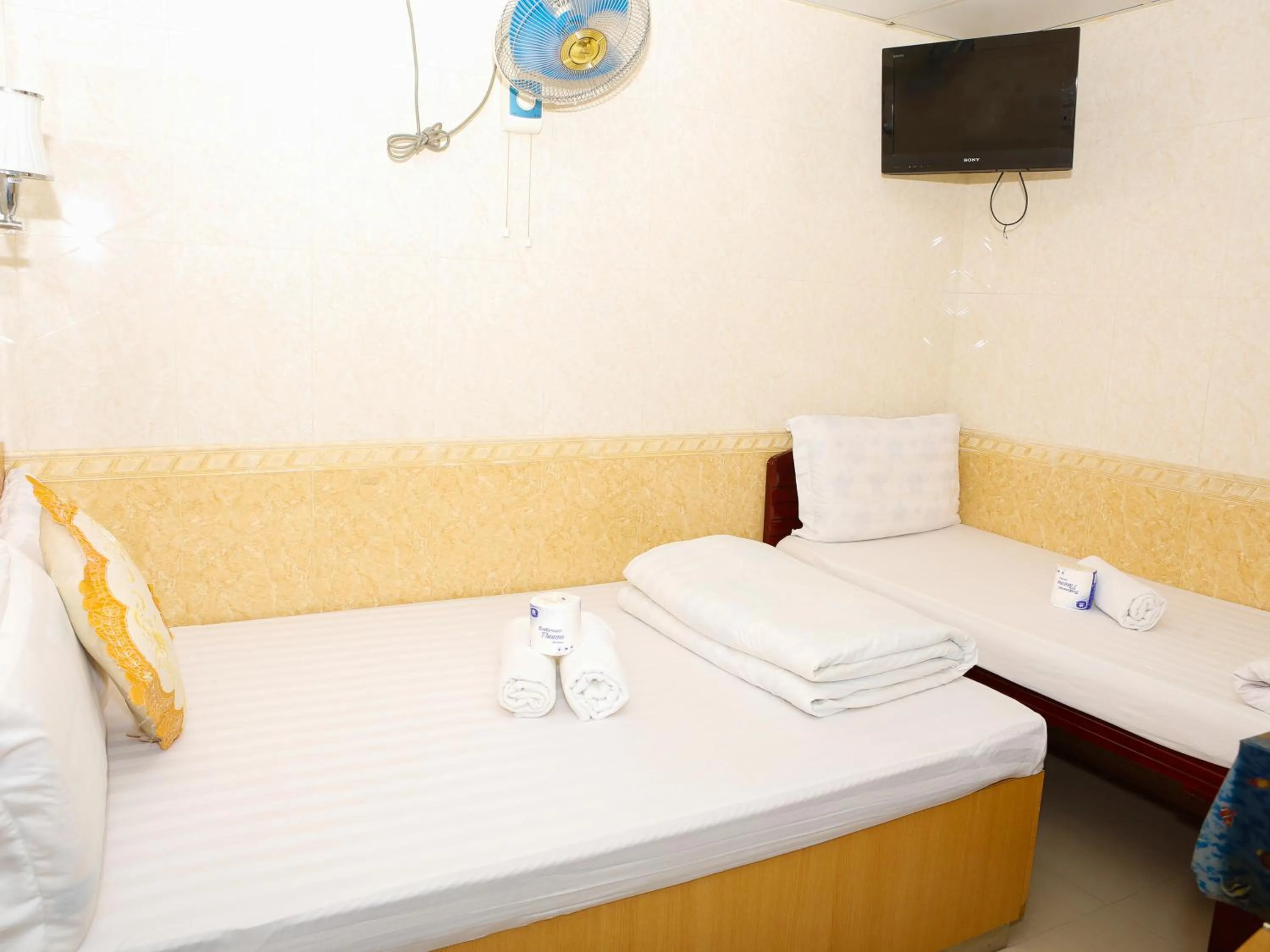 Bed in New Guangzhou Guest House