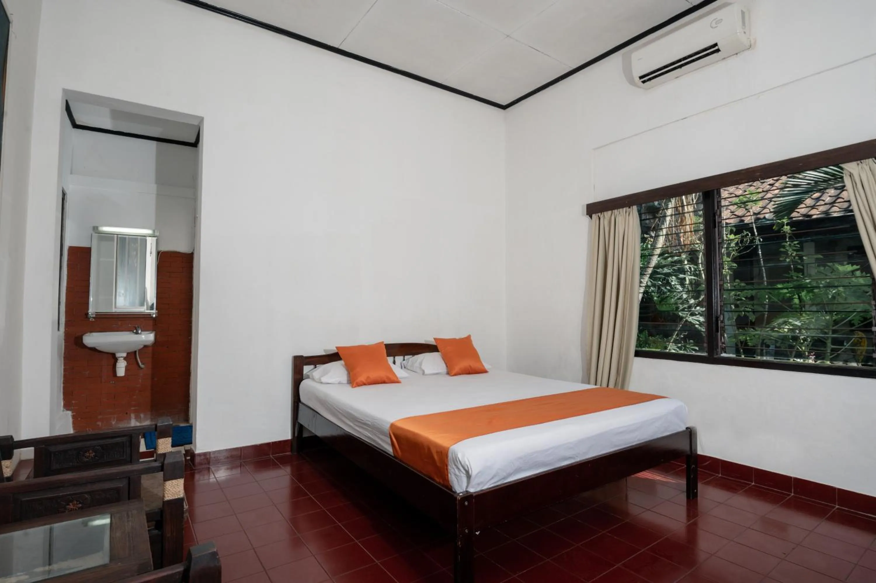 Bed in Oryza Hotel Malioboro