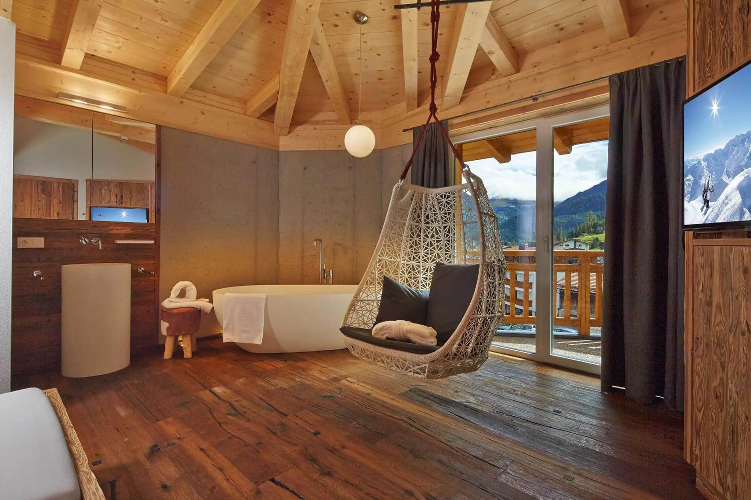 TV and multimedia in Alpendiamond Ski in & Bike Out apartments Top 200, 400 & penthouse 600