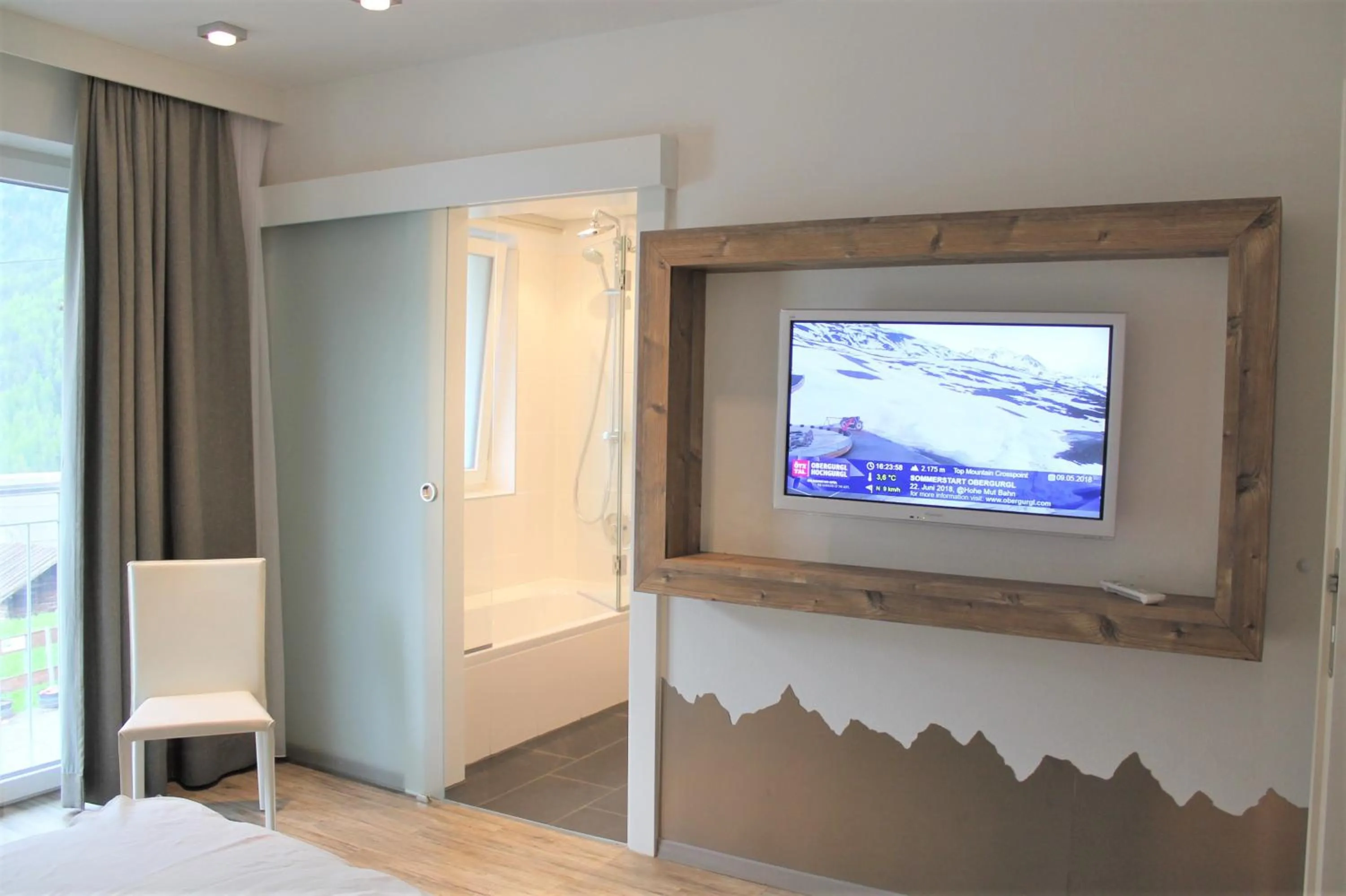 TV and multimedia in Alpendiamond Ski in & Bike Out apartments Top 200, 400 & penthouse 600