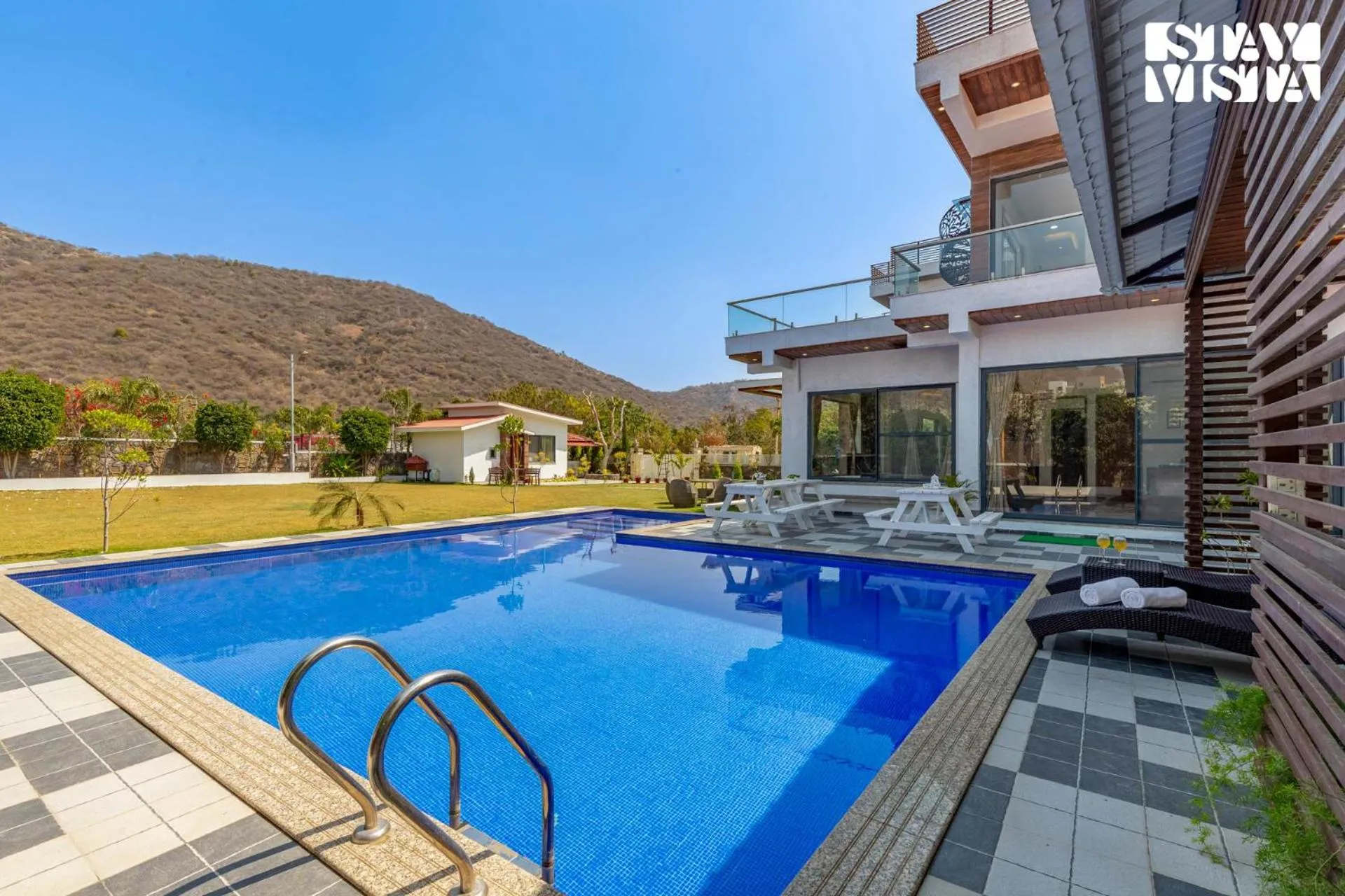 StayVista's Bella Dream - Mountain-View with Outdoor Pool, Lawn featuring a Gazebo & Indoor Games