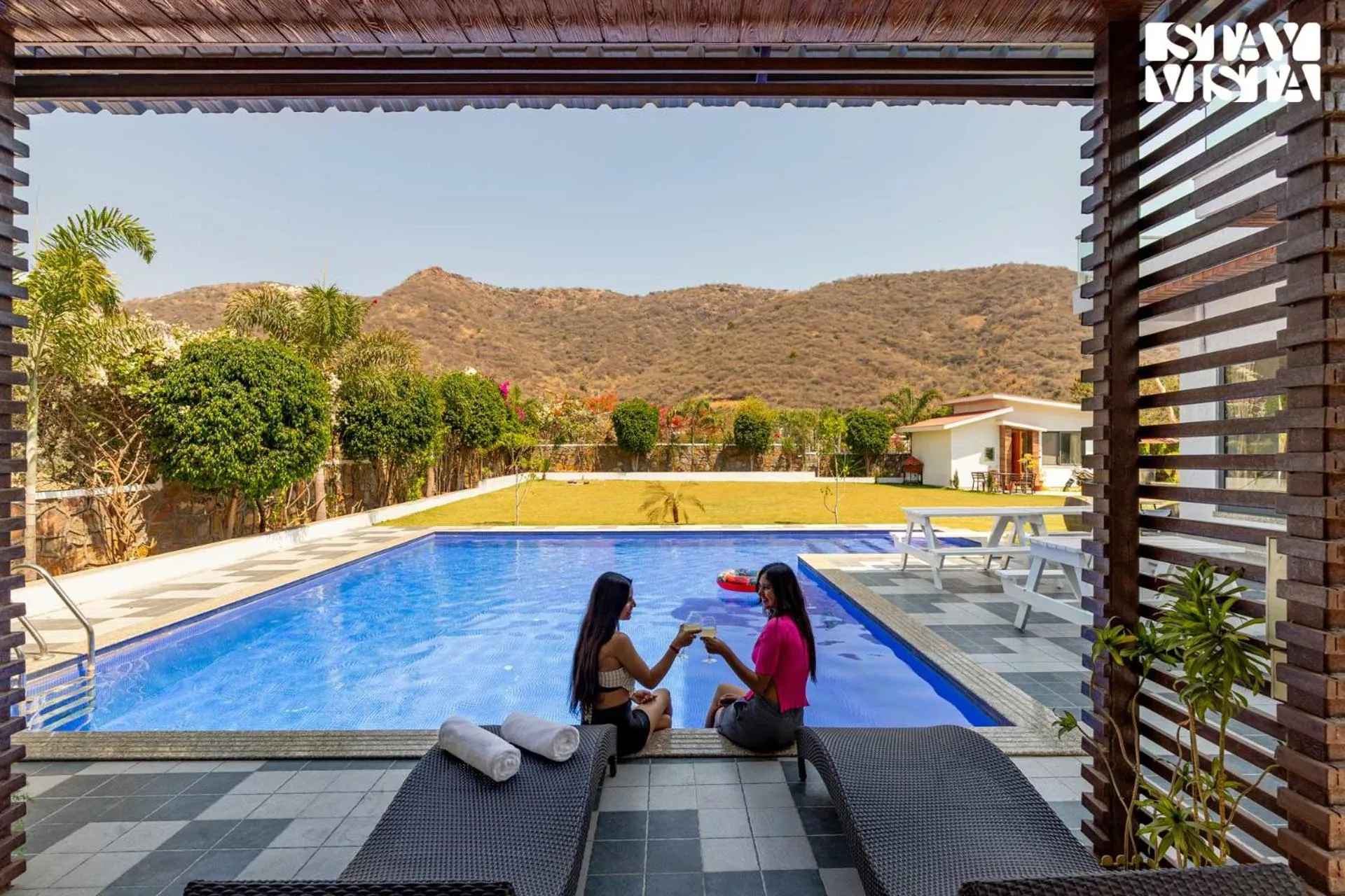 StayVista's Bella Dream - Mountain-View with Outdoor Pool, Lawn featuring a Gazebo & Indoor Games
