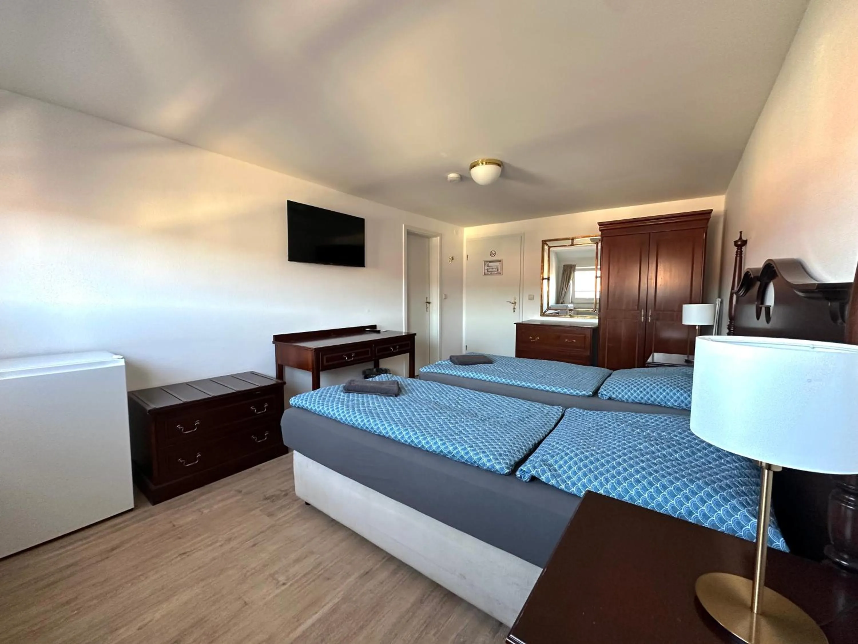 Bed in Gästehaus am Harz - Monteurzimmer mit Hotelstandard