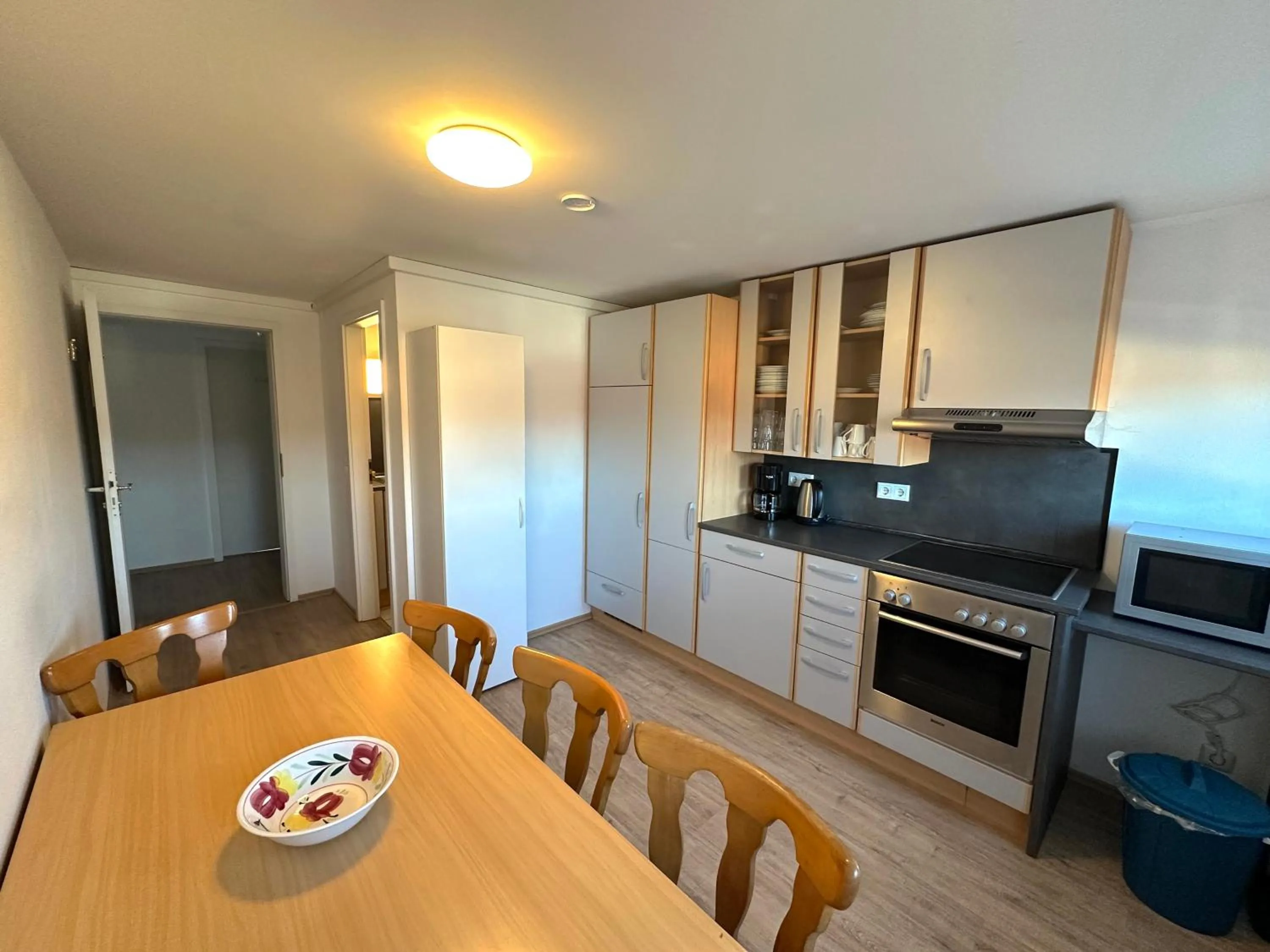 Kitchen or kitchenette in Gästehaus am Harz - Monteurzimmer mit Hotelstandard