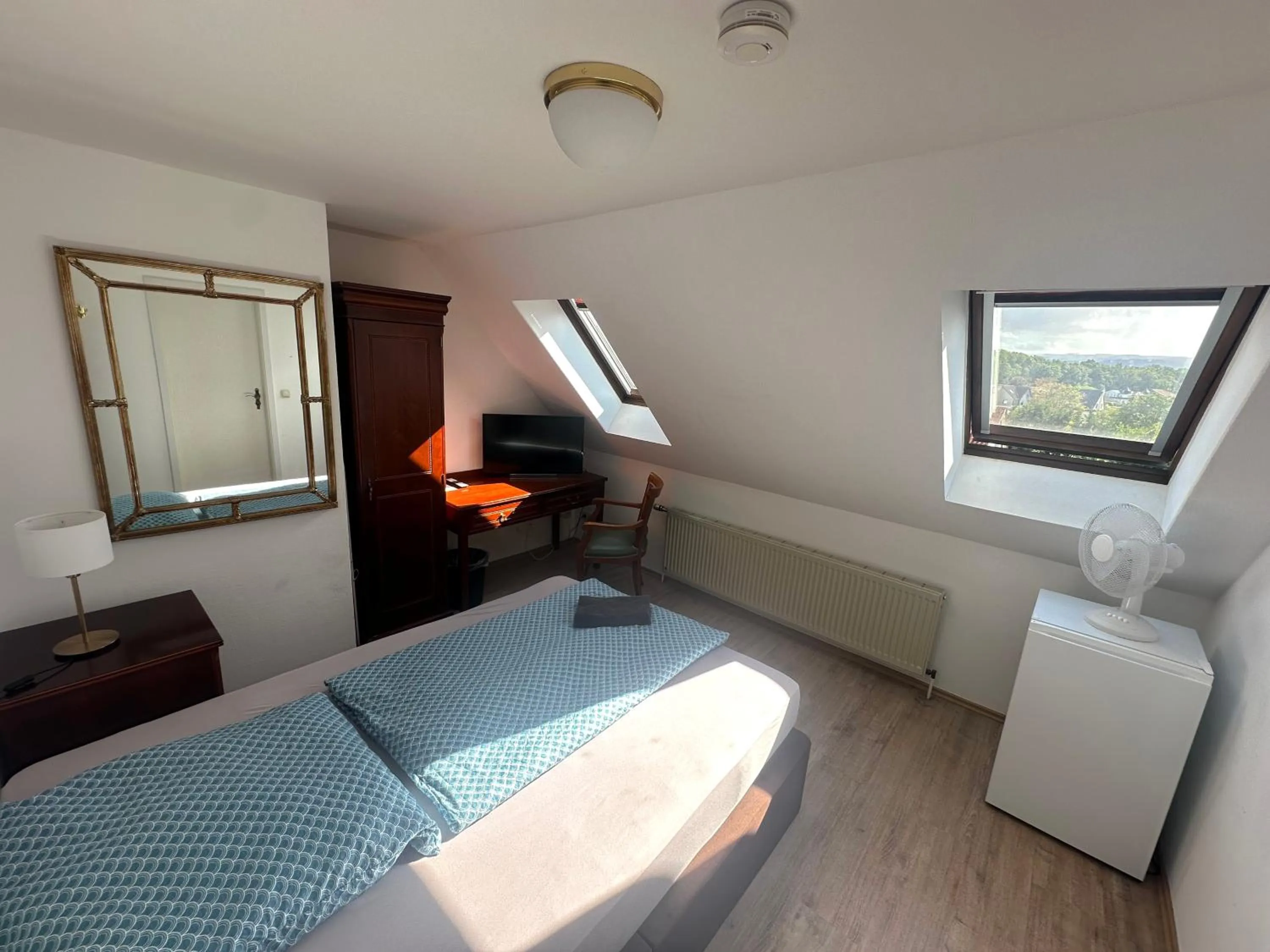 Bed in Gästehaus am Harz - Monteurzimmer mit Hotelstandard