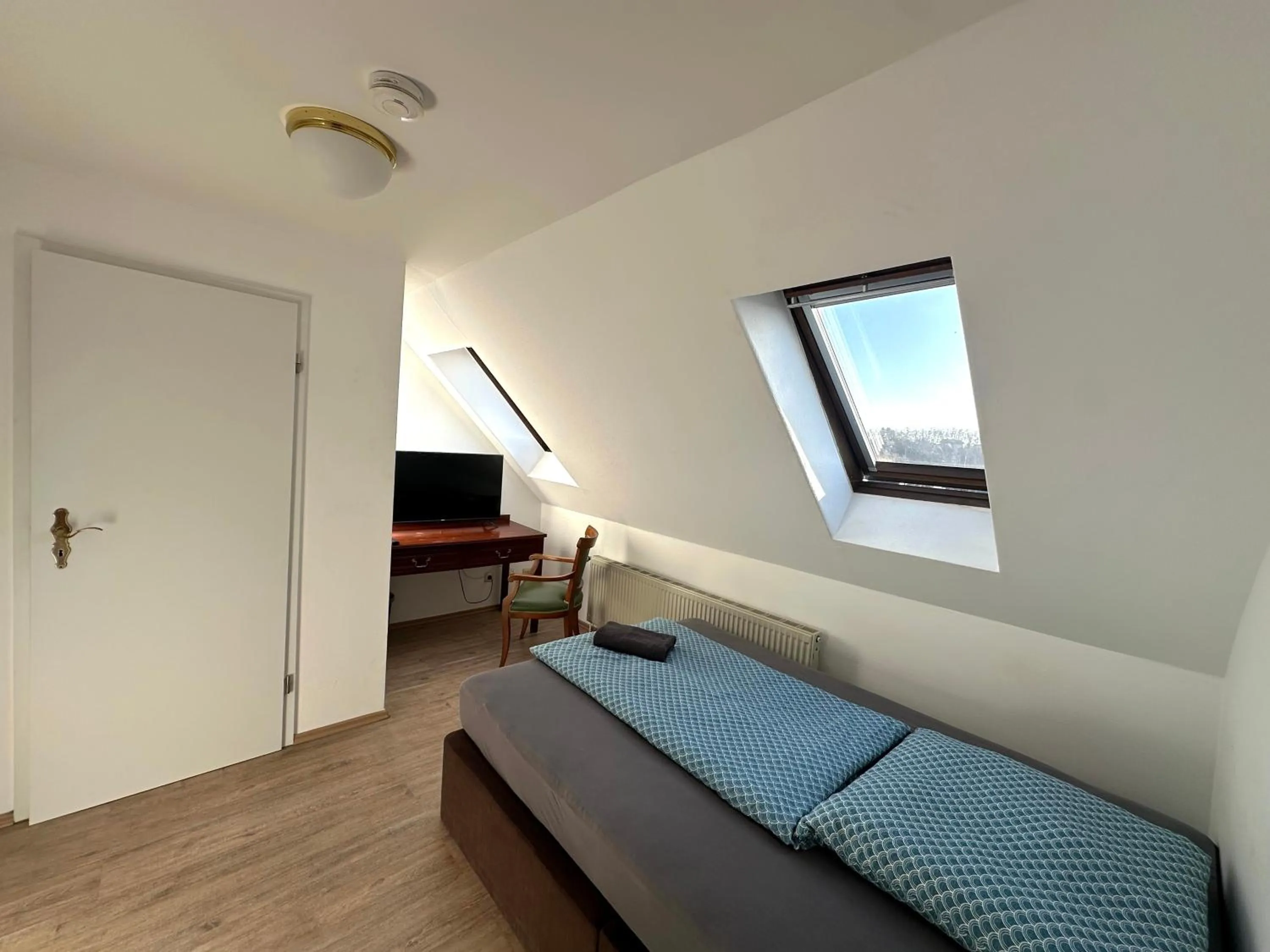 Bed in Gästehaus am Harz - Monteurzimmer mit Hotelstandard