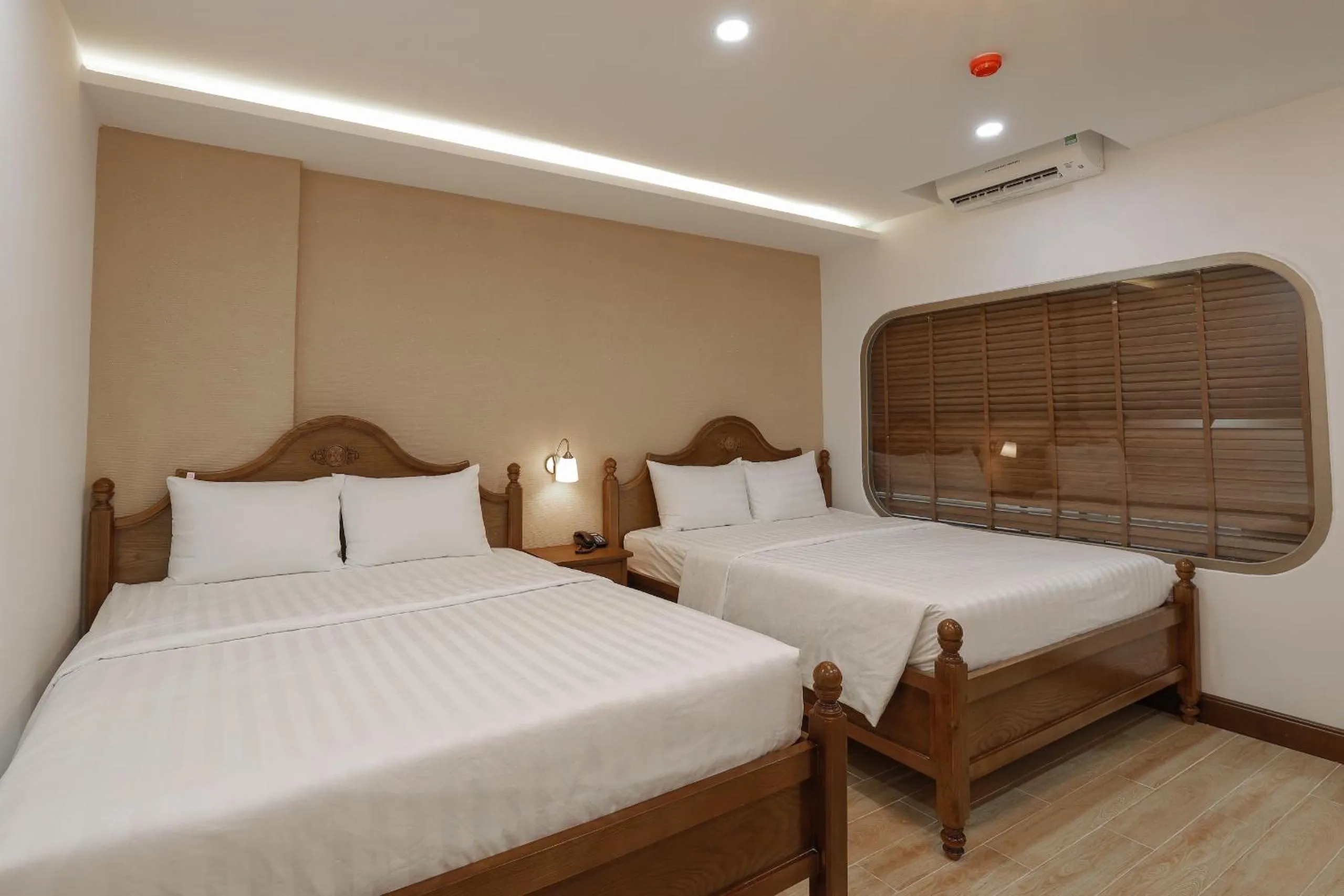 Bed in Maya Hotel 4