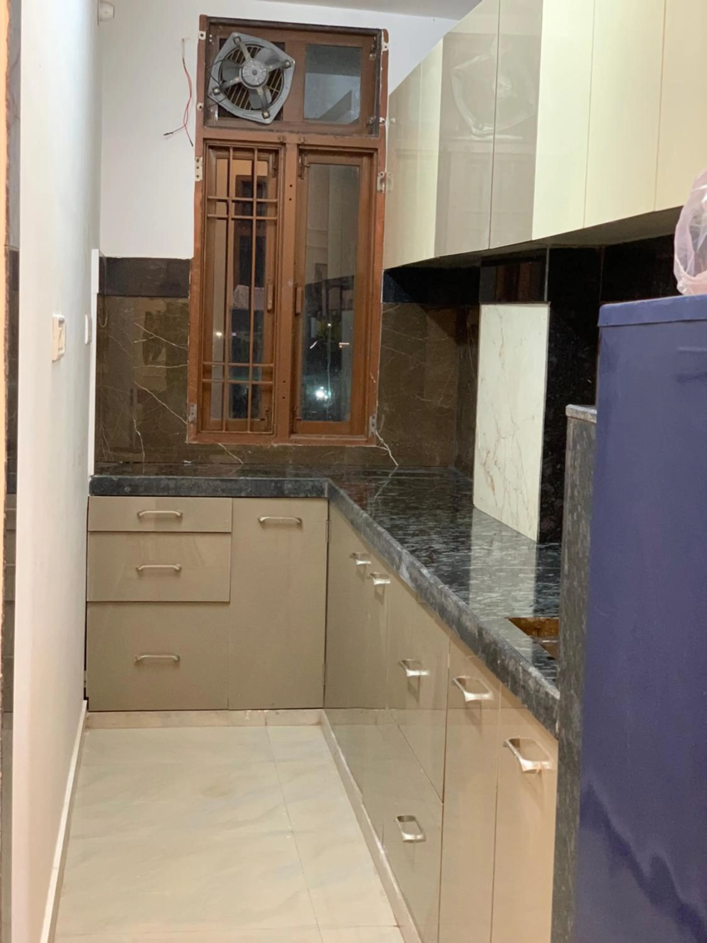 Kitchen or kitchenette in Neewara Residency Apartment