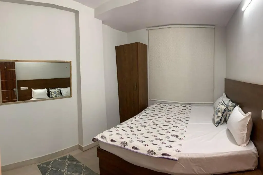 Bed in Neewara Residency Apartment