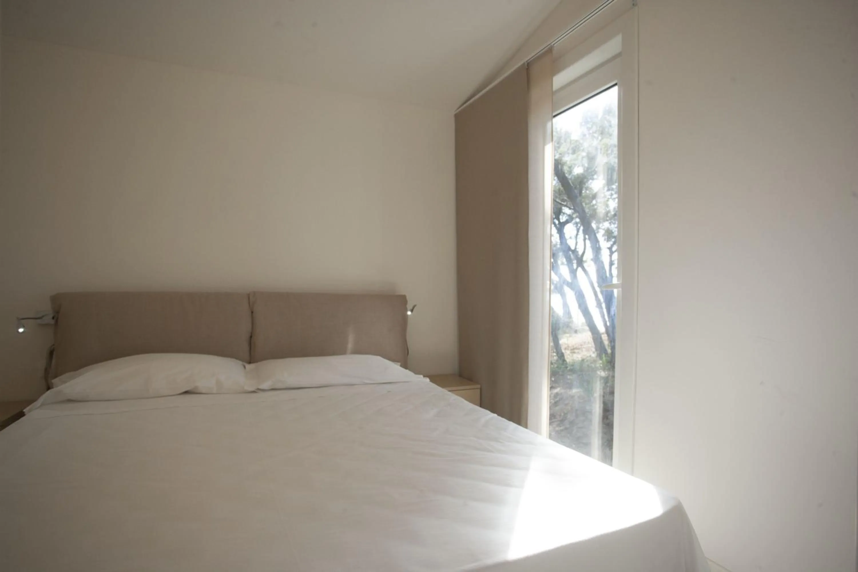 Bed in PuntAla Camp & Resort