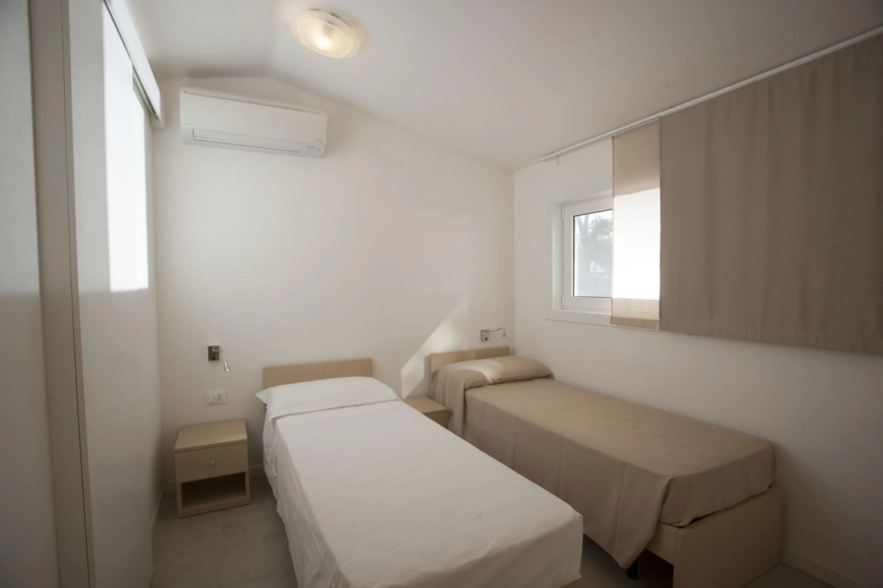 Bed in PuntAla Camp & Resort