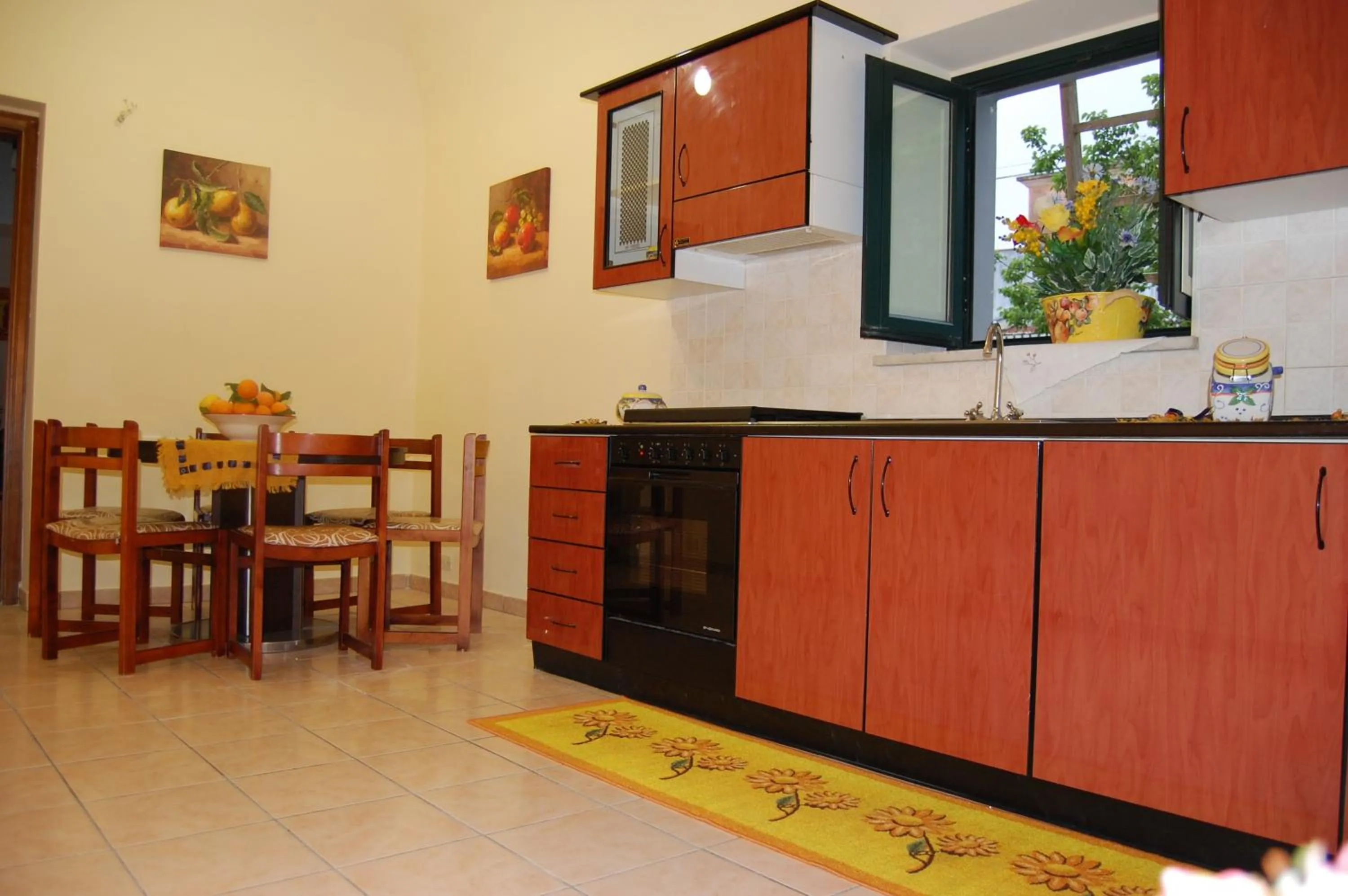 Kitchen or kitchenette in Albicocche House