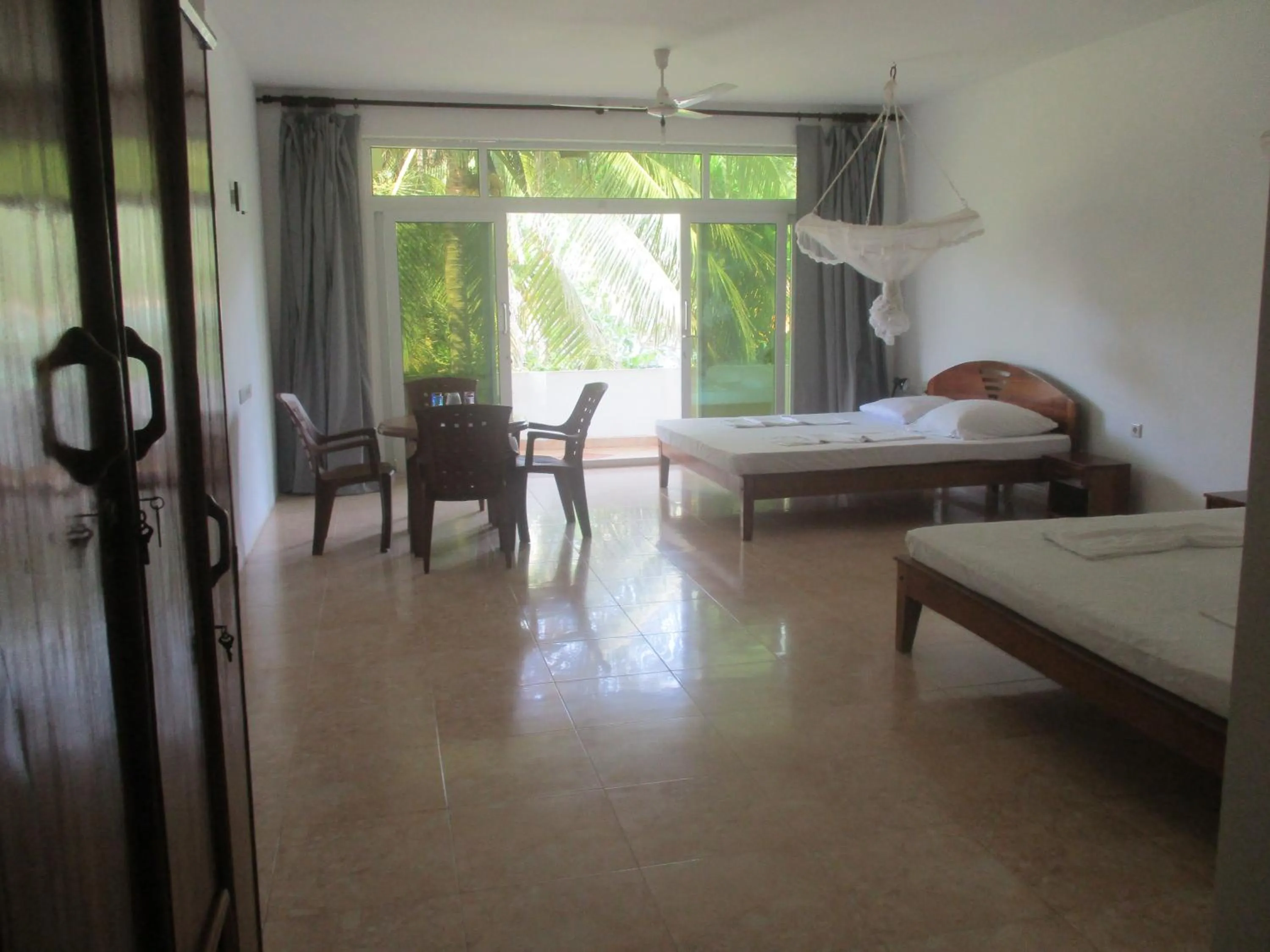 Family Room with Balcony in Raja Beach Hotel