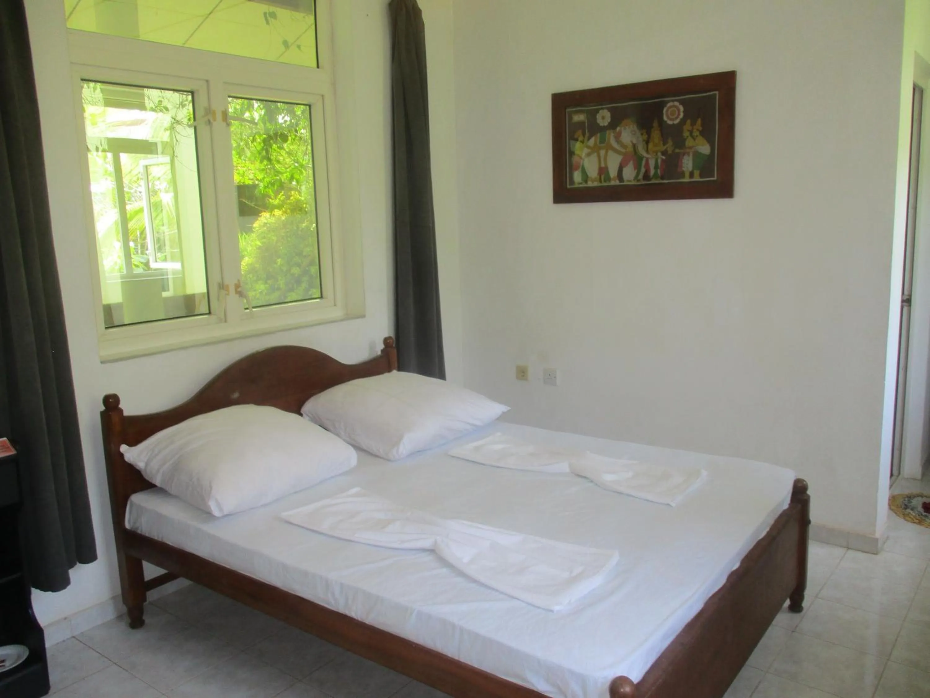 Standard Bungalow with Fan - single occupancy in Raja Beach Hotel