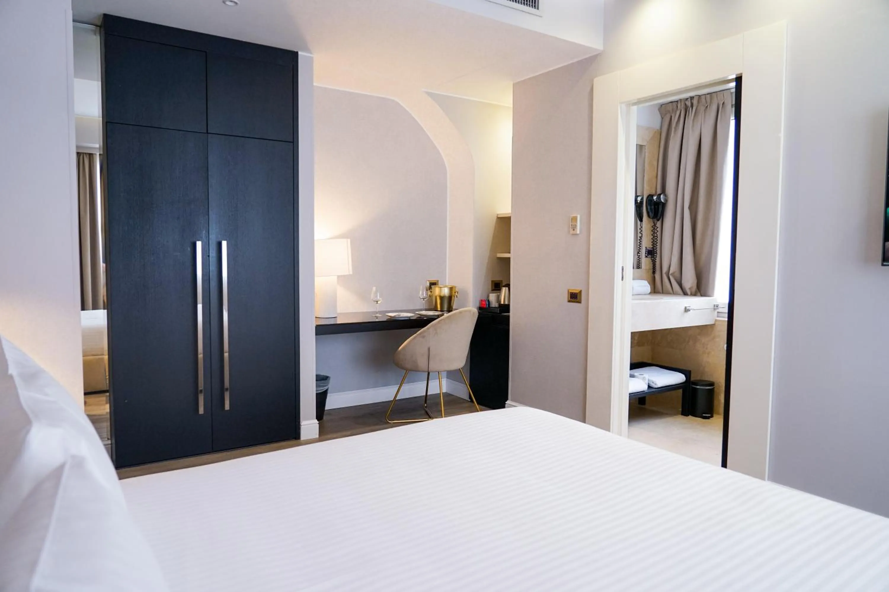 Bed in The Unique Hotel