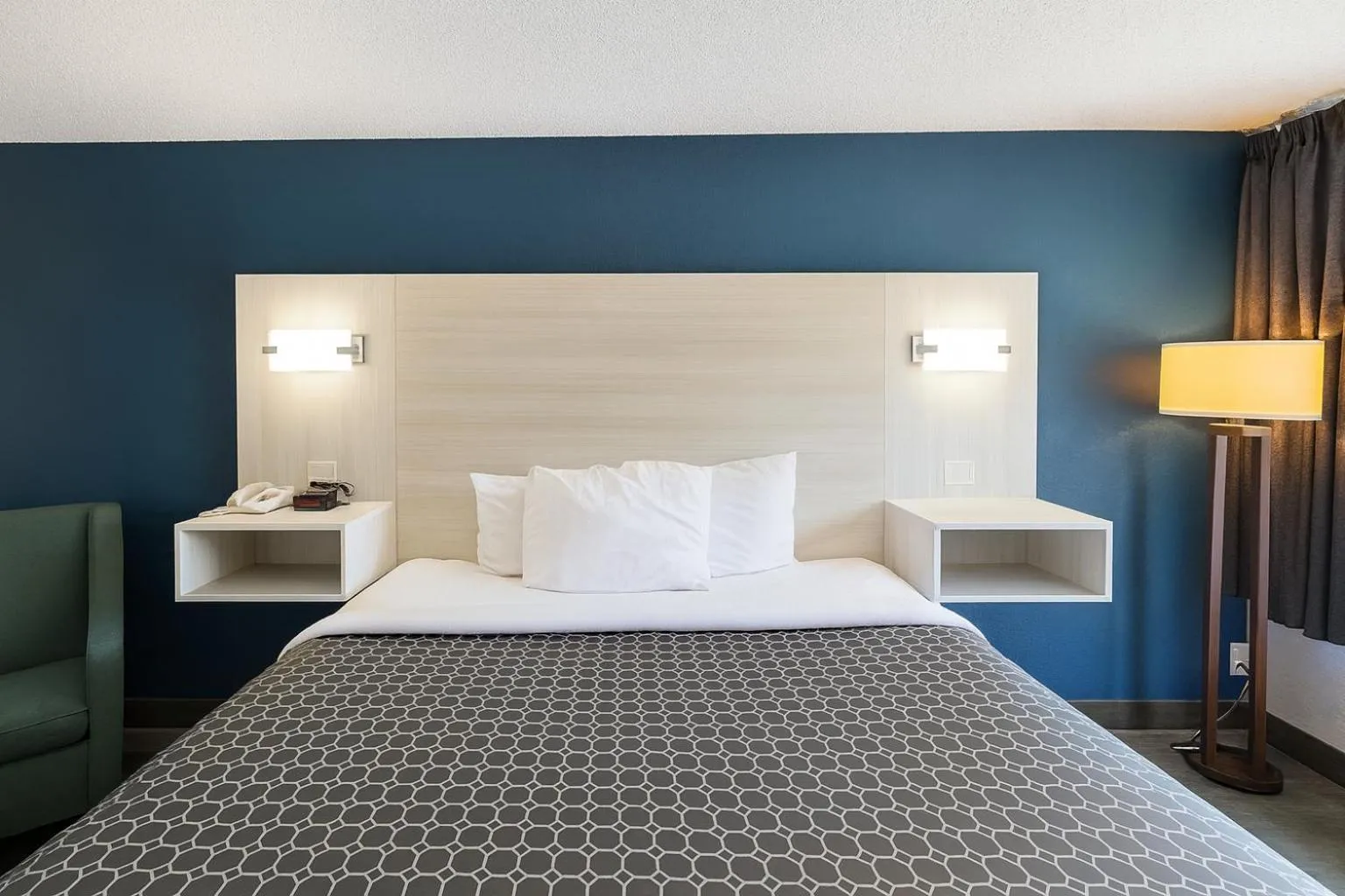 Bedroom in Suburban Studios McDonough South I-75