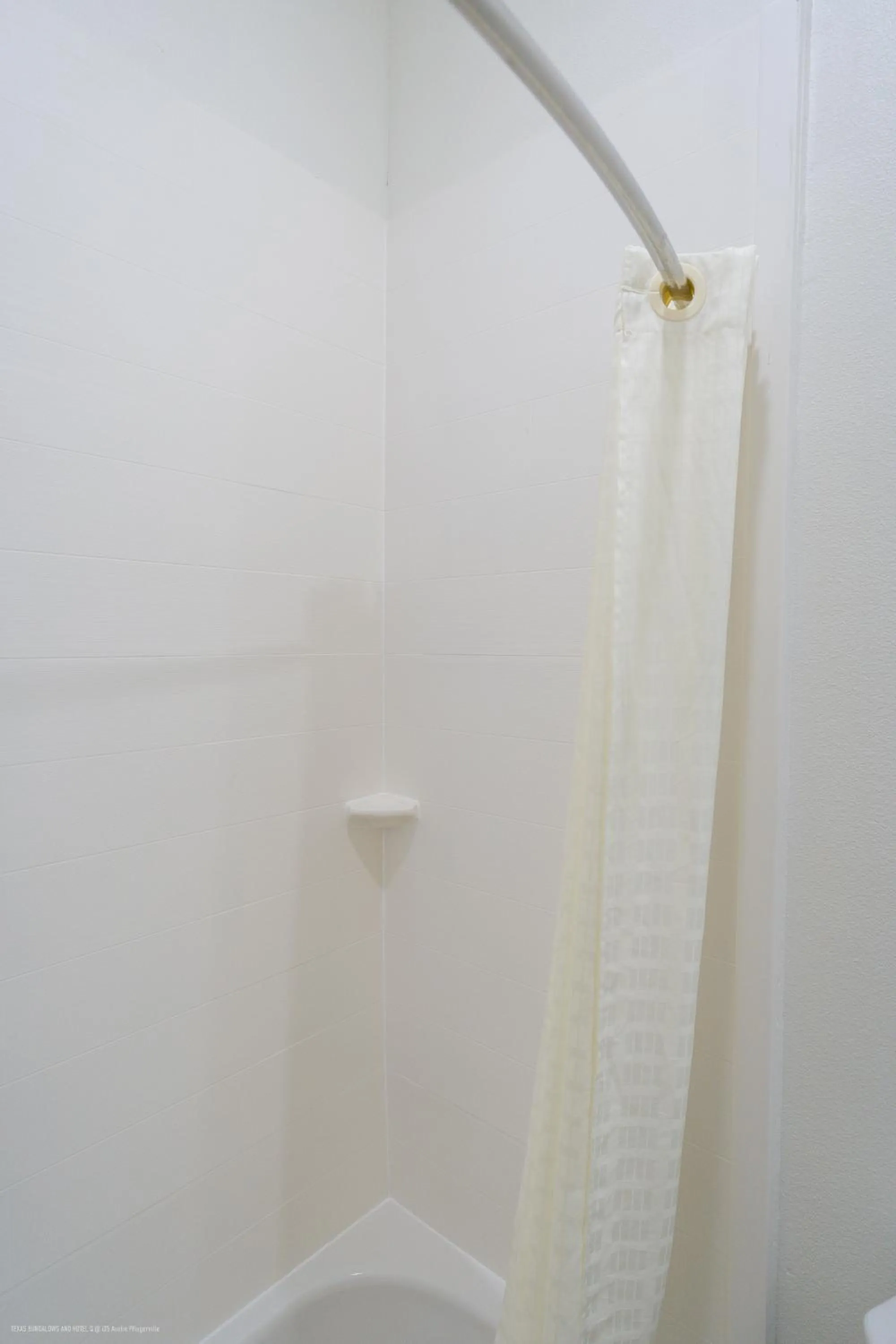 Shower in Texas Bungalows Hotel & Hotel Que at Lakeline Austin Cedar Park