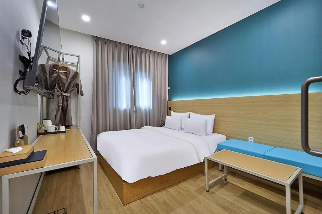 Bed in Hotel Calmrest