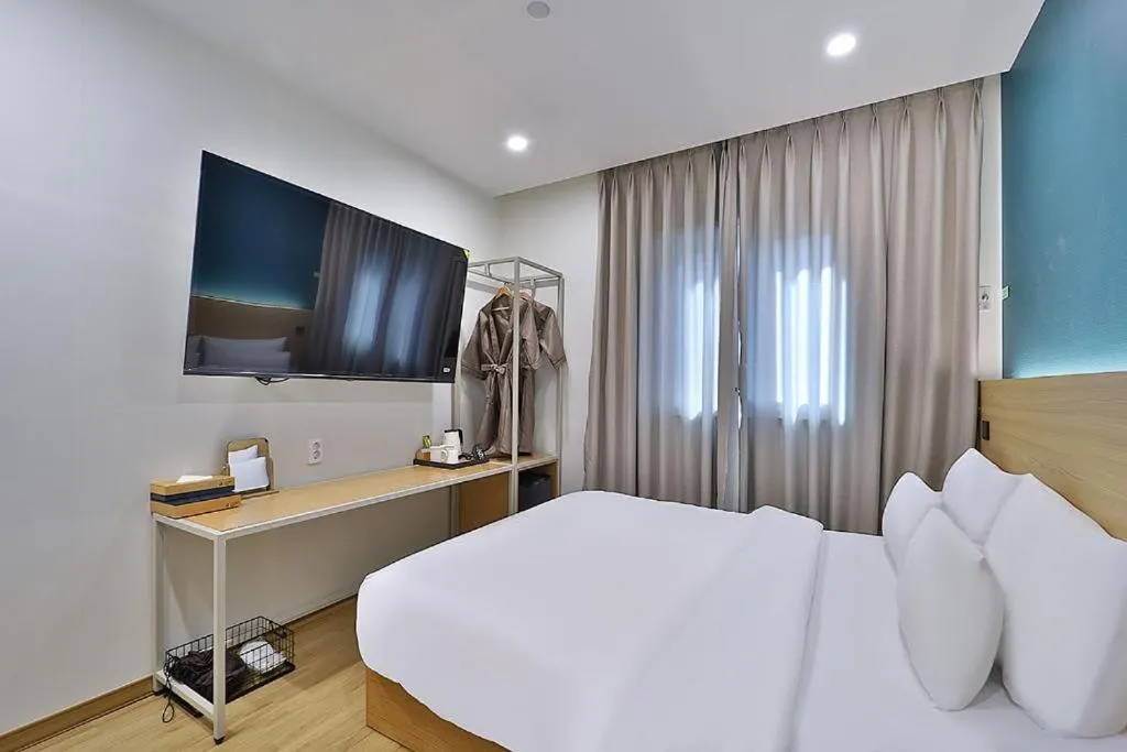 Bed in Hotel Calmrest