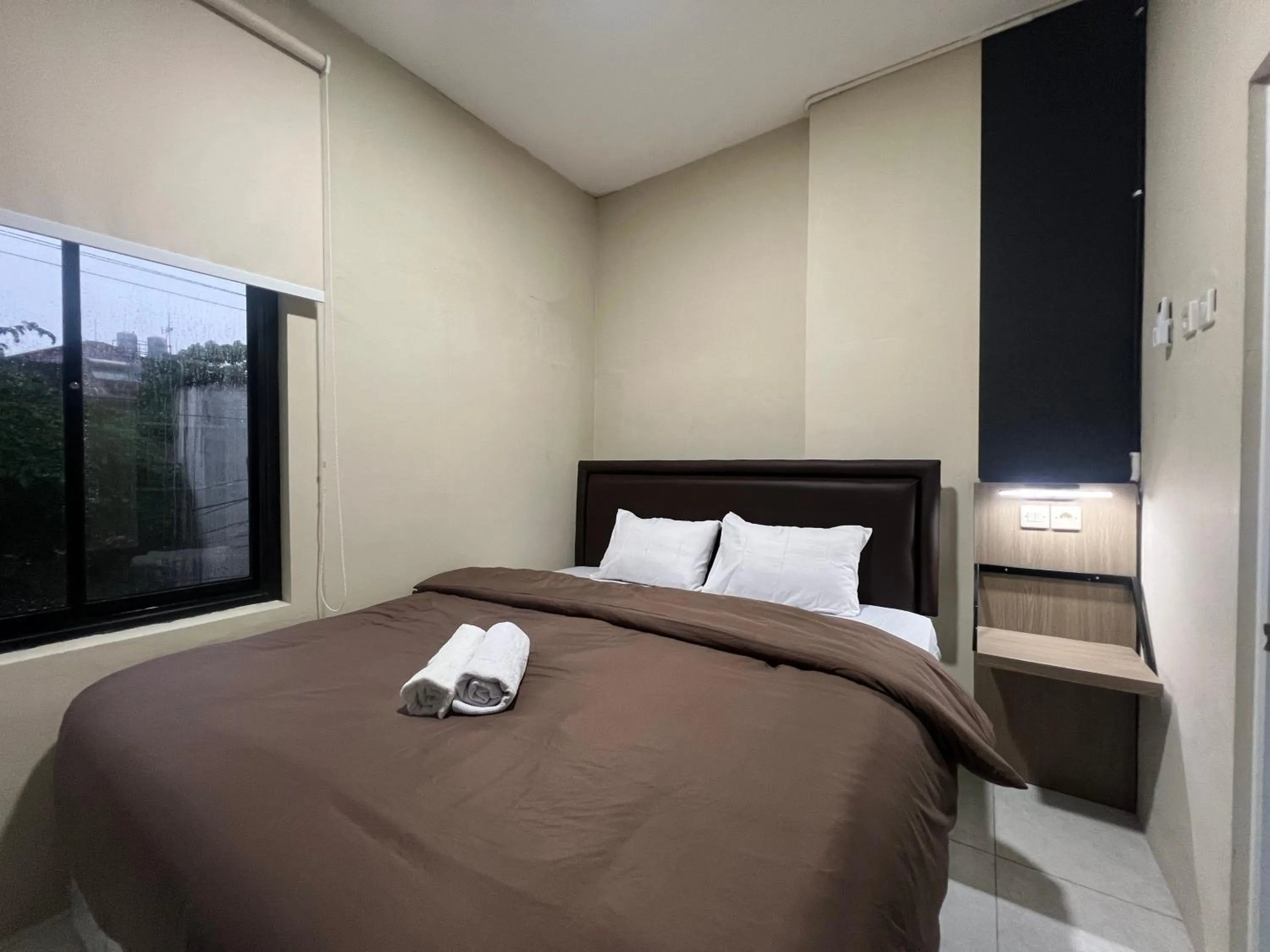 Bed in Brenn Hotel Semarang Mitra Reddoorz