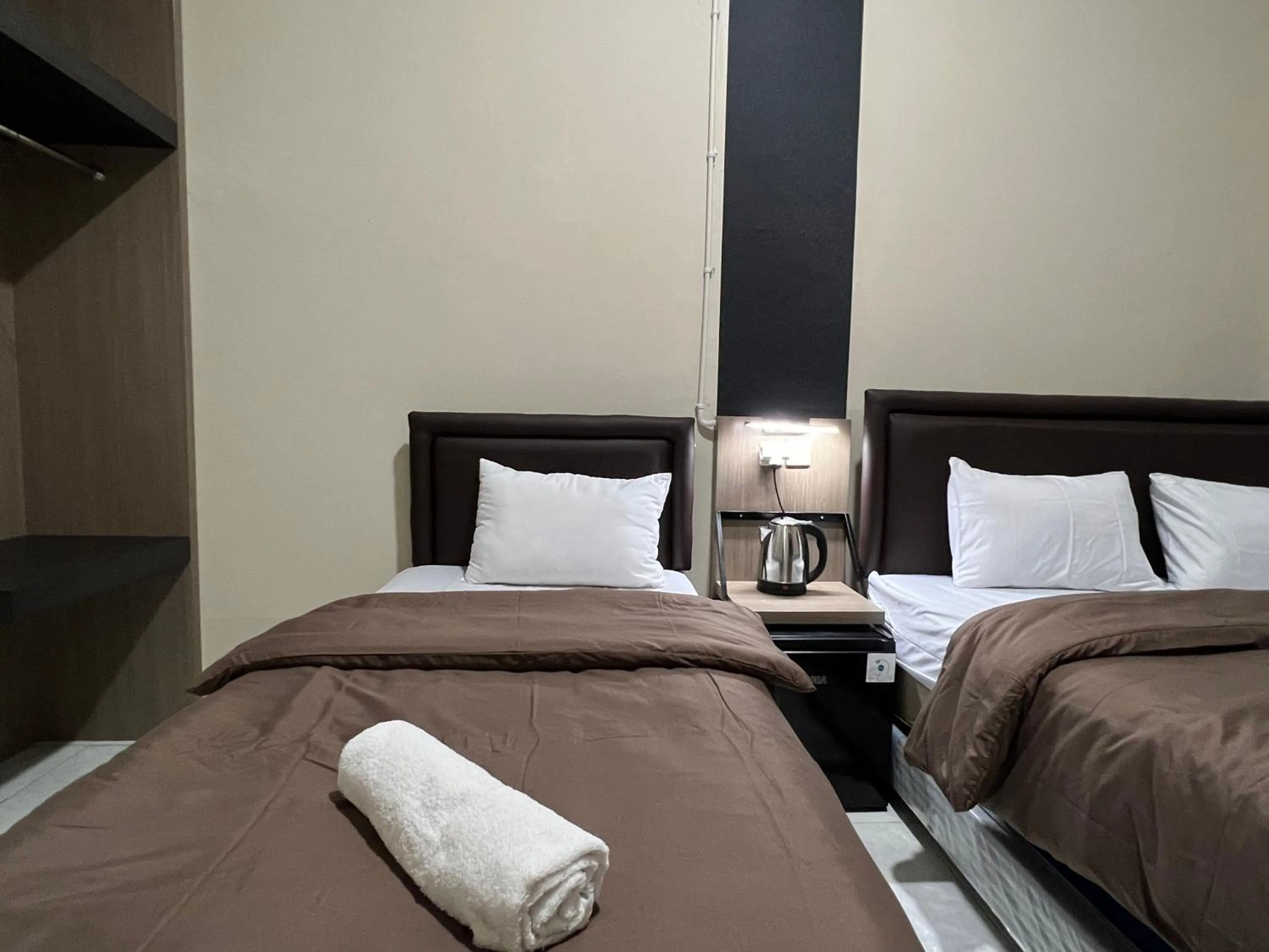 Bed in Brenn Hotel Semarang Mitra Reddoorz