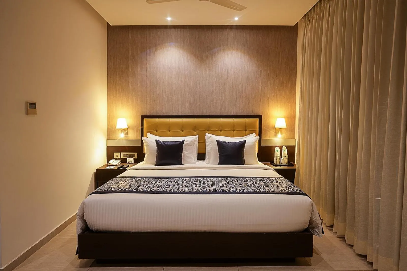 Bedroom, Bed in Grand Continent Malleshwaram A Sarovar Portico Affiliate Hotel