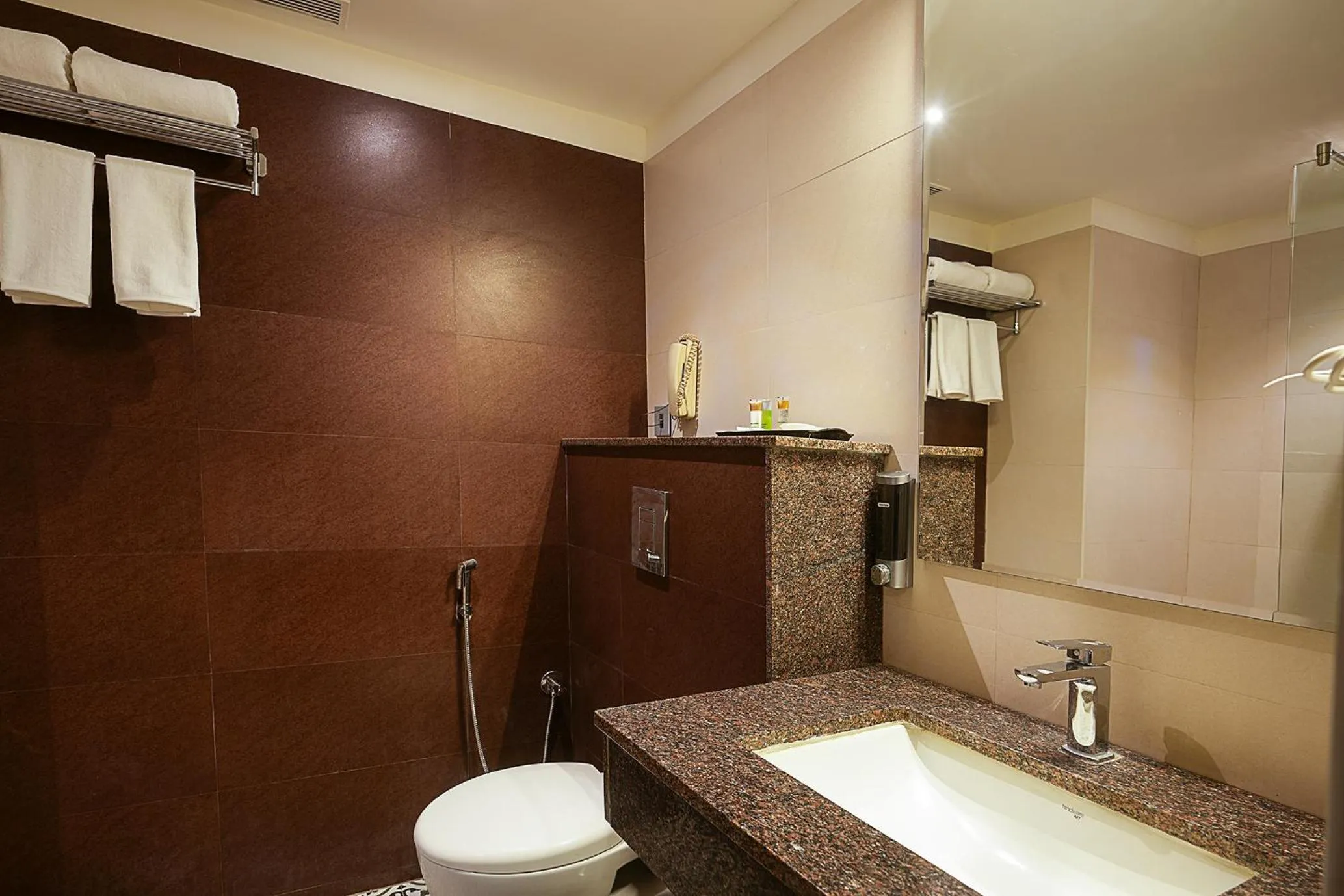 Bathroom in Grand Continent Malleshwaram A Sarovar Portico Affiliate Hotel