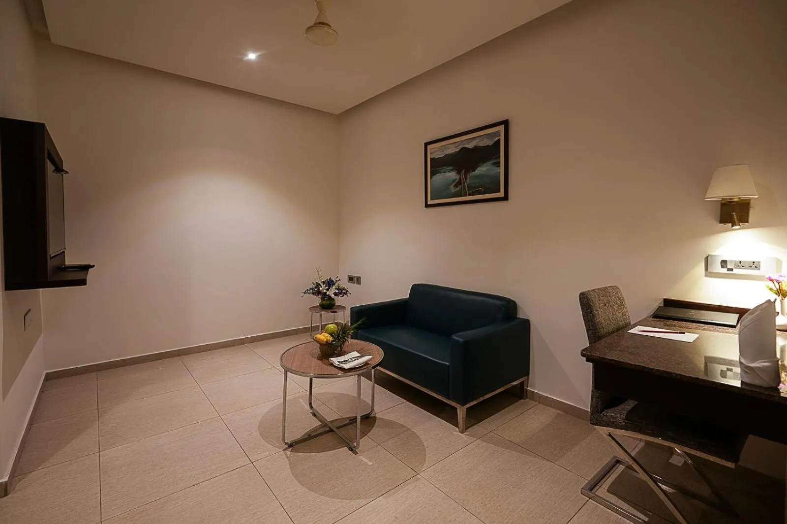 Seating area in Grand Continent Malleshwaram A Sarovar Portico Affiliate Hotel