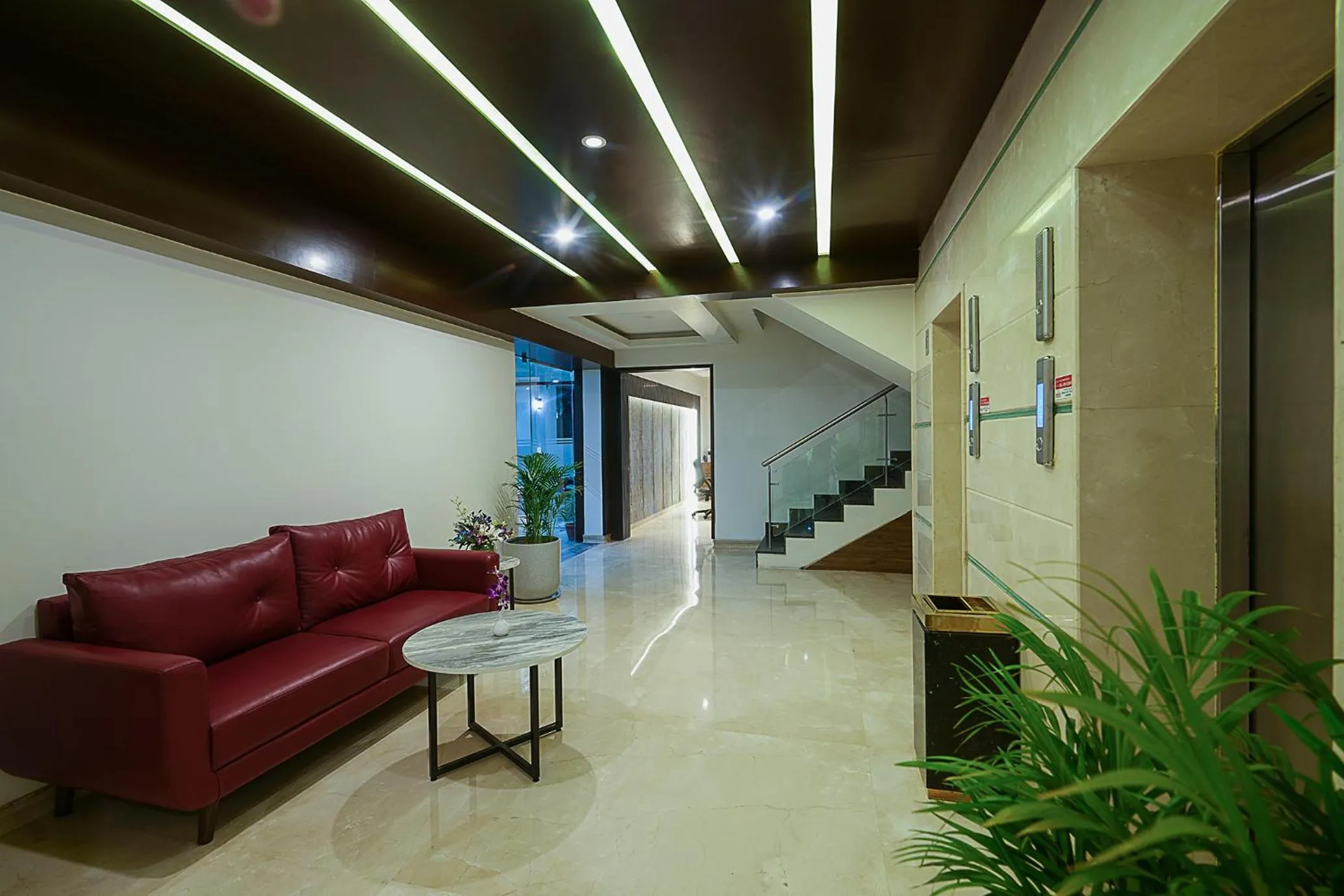 Seating area in Grand Continent Malleshwaram A Sarovar Portico Affiliate Hotel